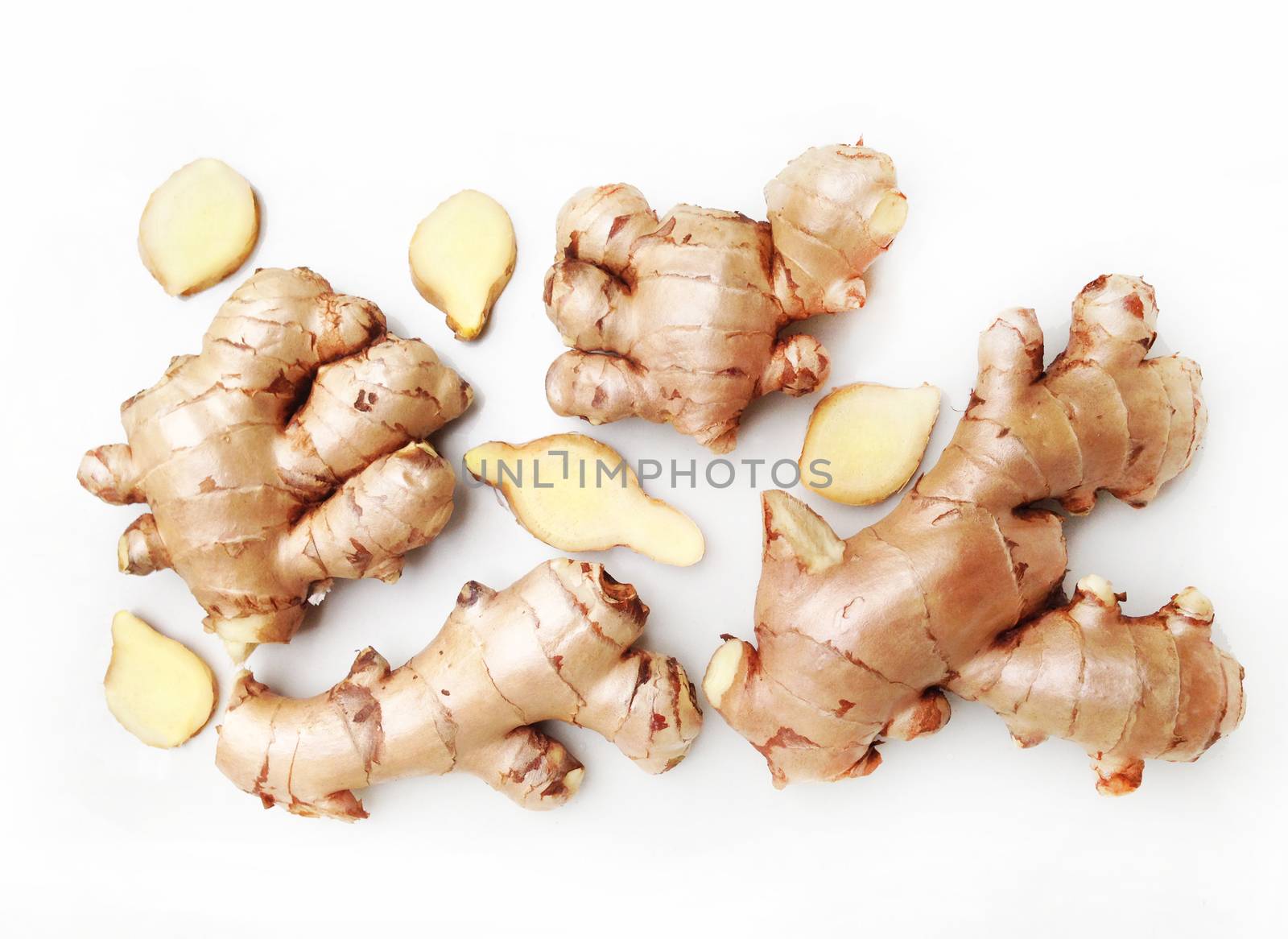 Fresh ginger on white background by Bowonpat