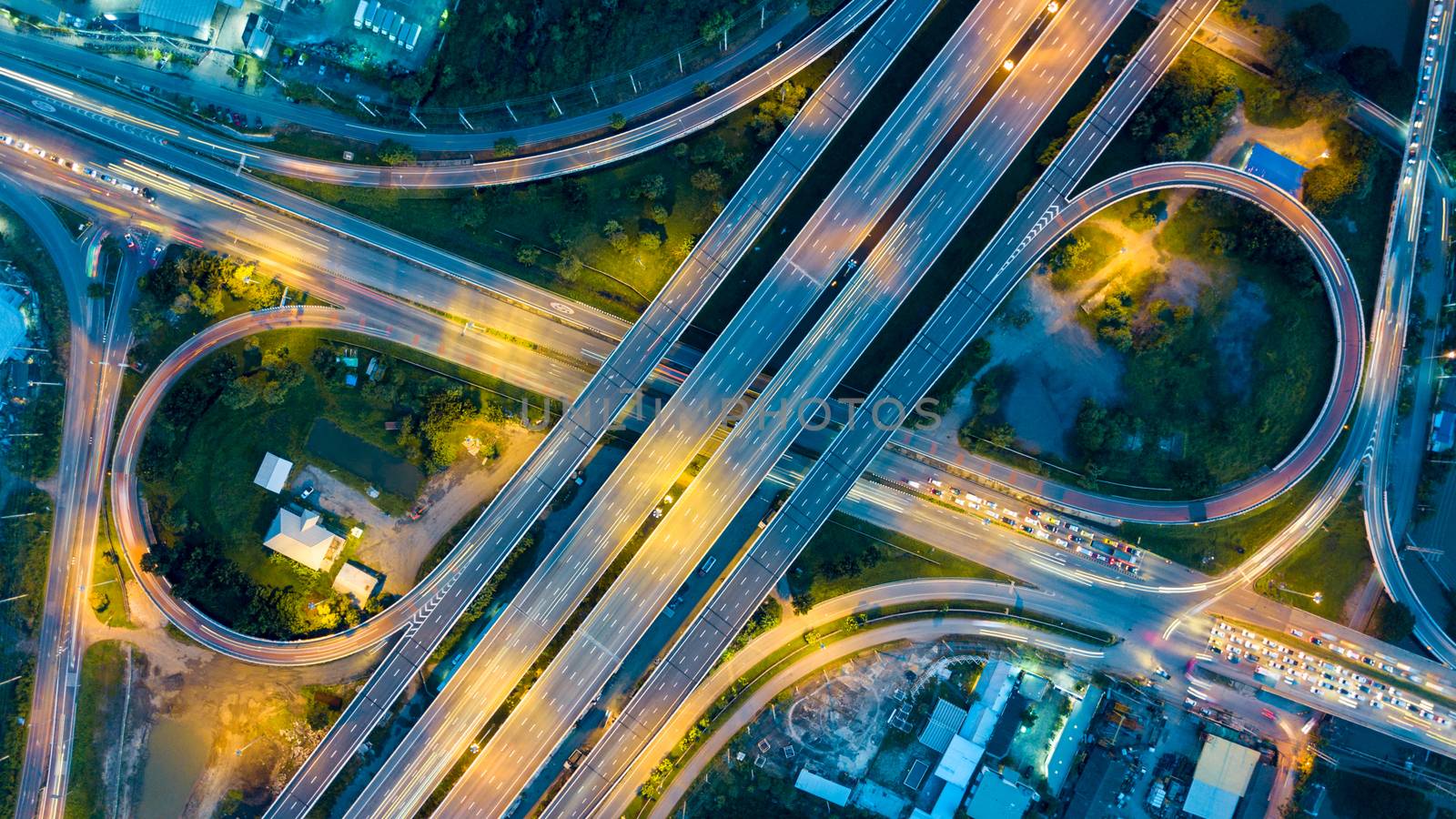Aerial view of expressway at night by antpkr