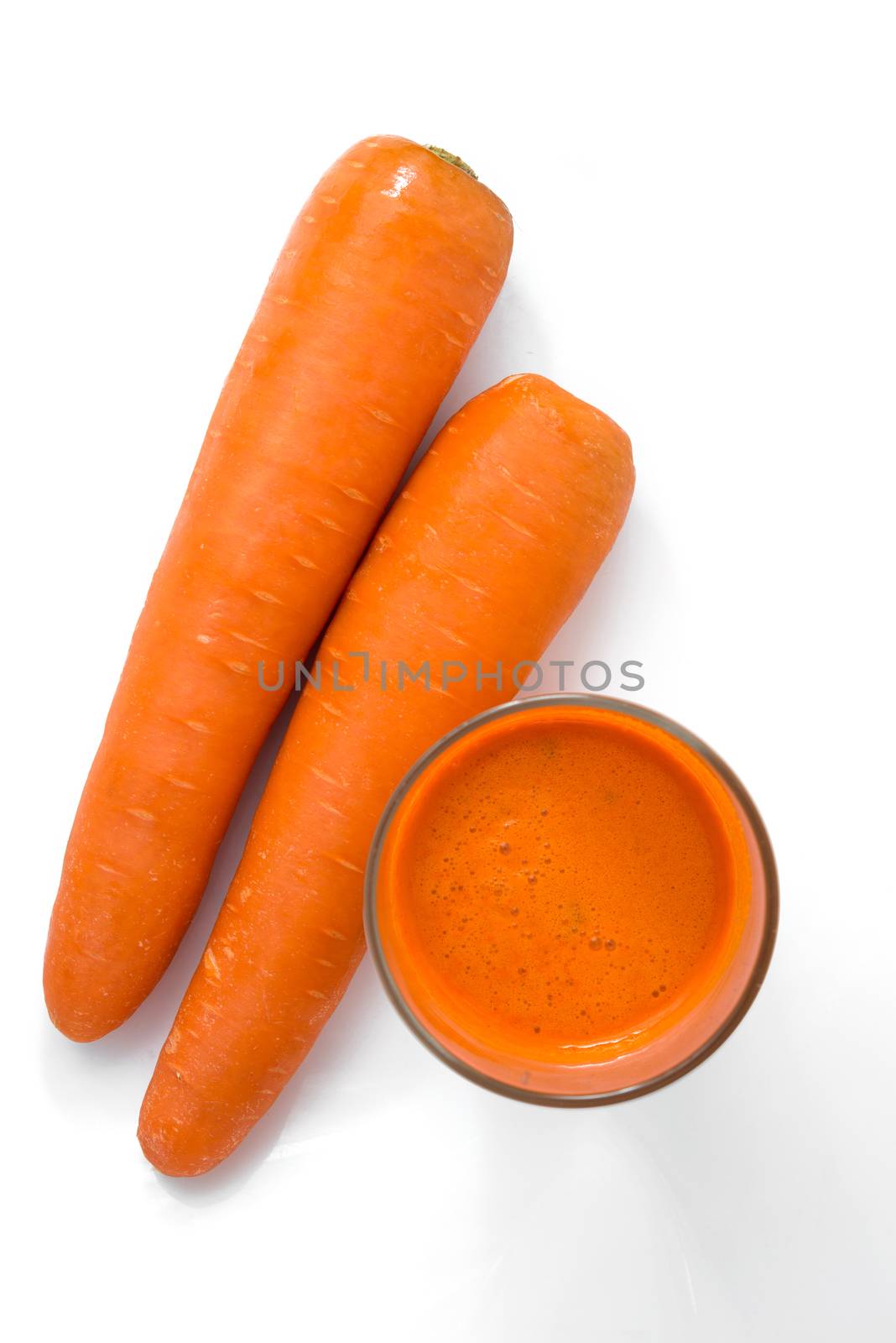 grass of carrot juice isolated on white background