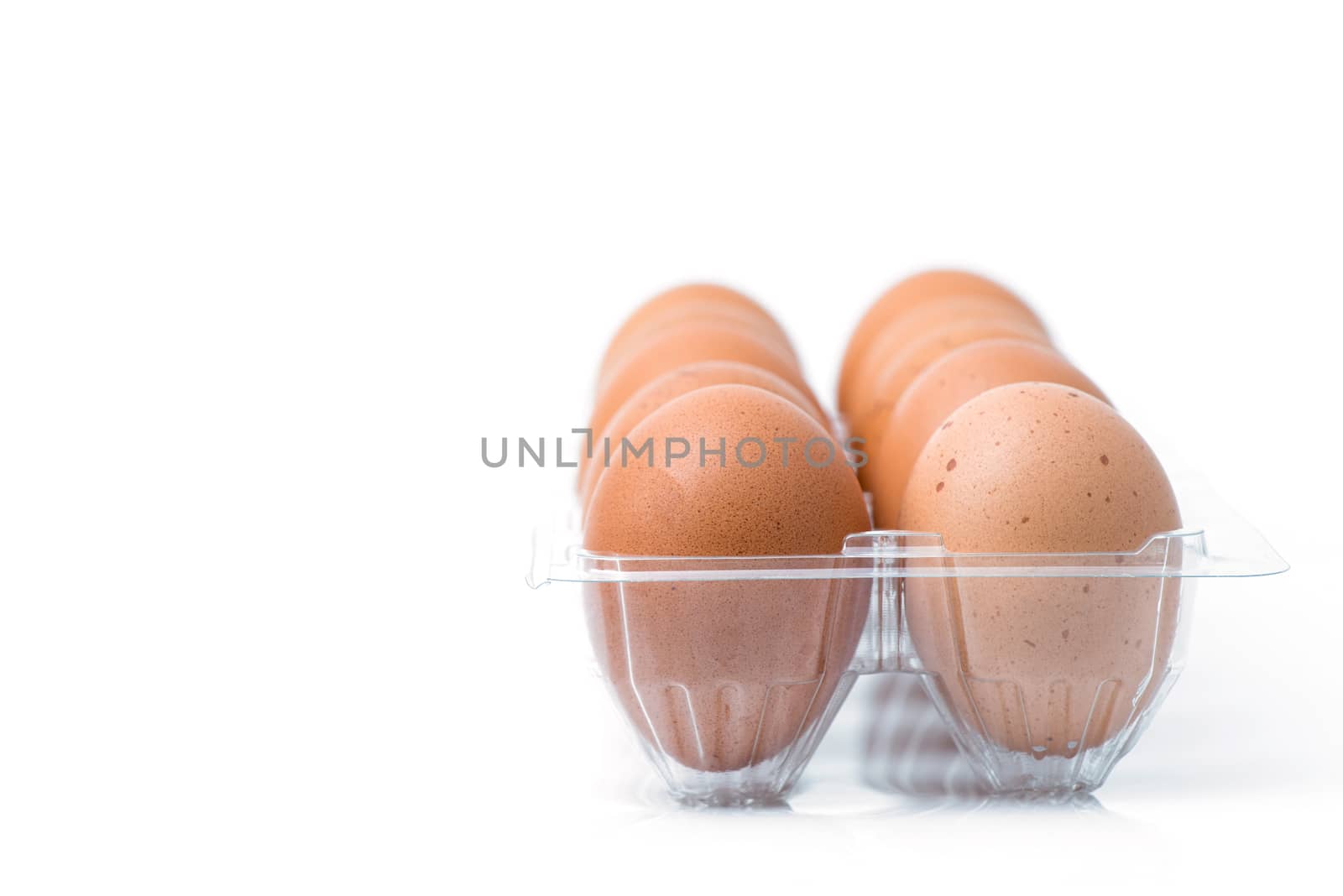 eggs packed isolated white background by antpkr
