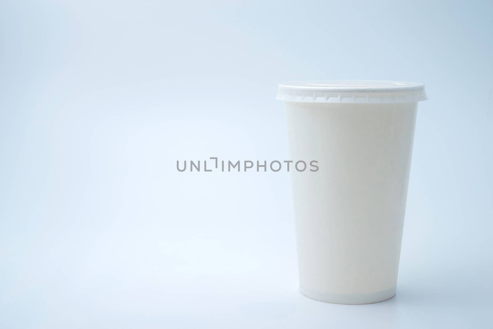 paper cup of coffee on white background