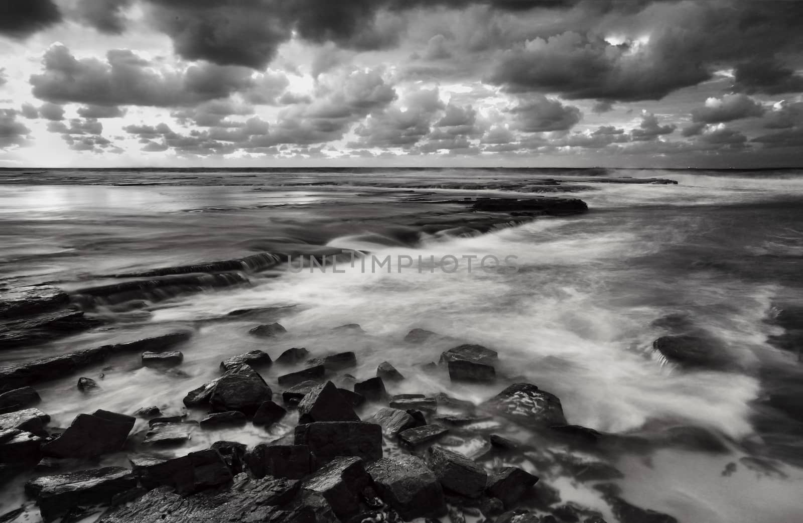 Tidal flows across the rocks at Little Austinmer Beach near Wollongong