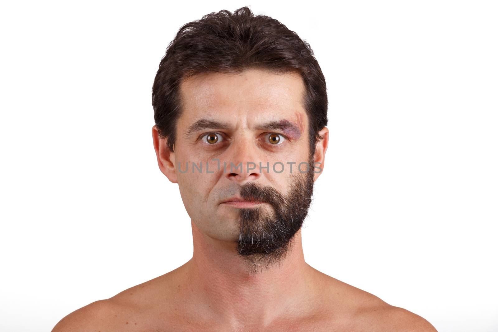 split personality - portrait of man with half shaved and unshaven face