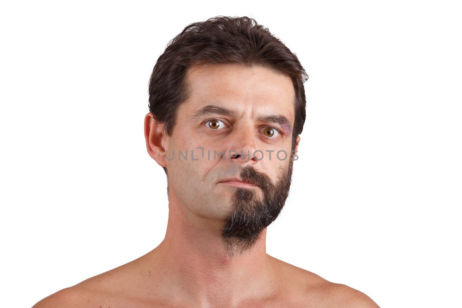 split personality - portrait of man with half shaved and unshaven face