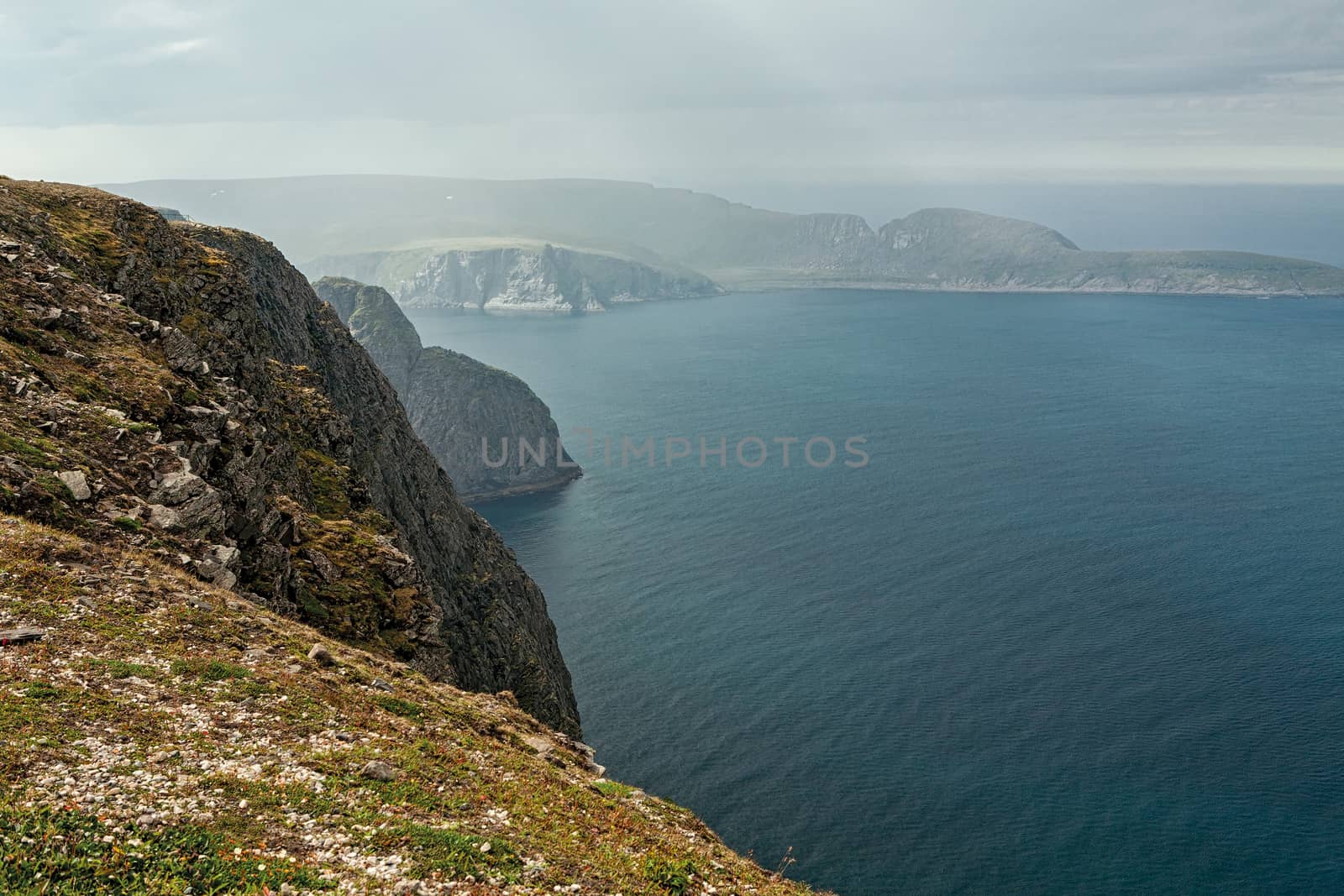 Cliff and ocean in North Cape in Mageroya island, the most northerly point of Europe, Norway