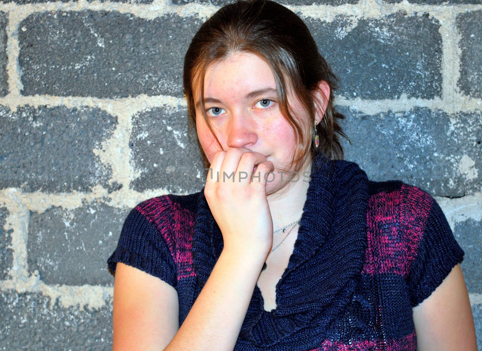 Female beauty fashion model in studio basement.