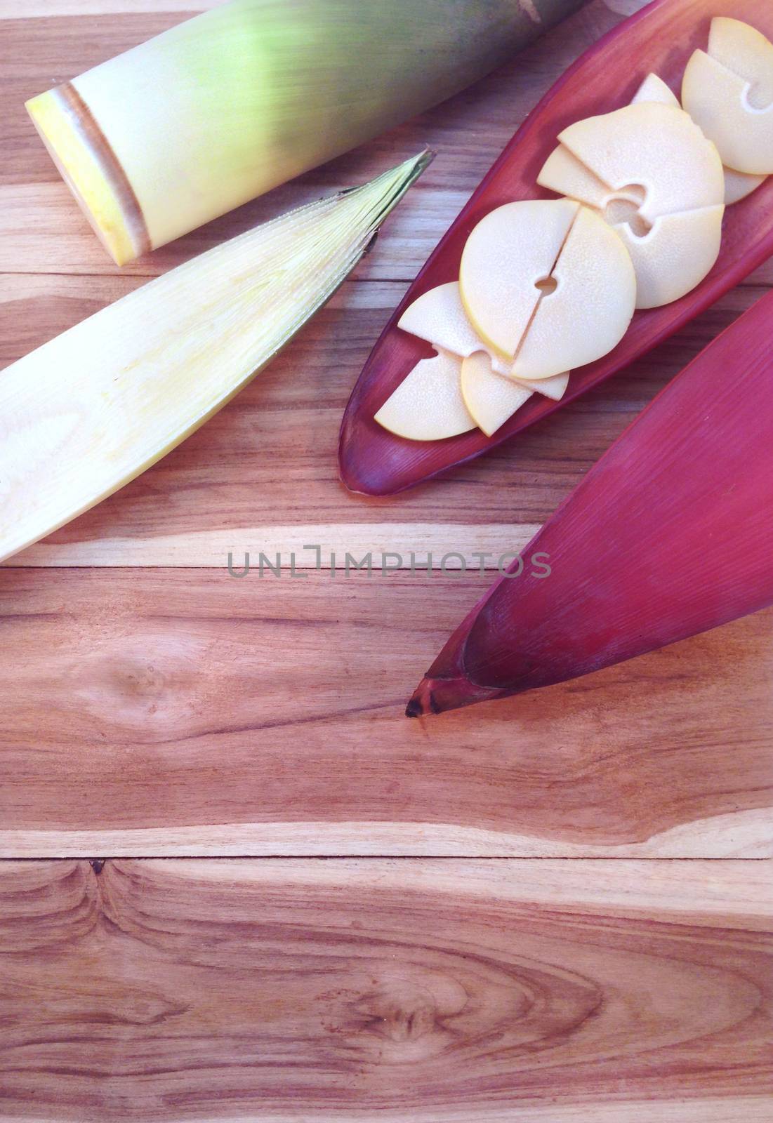 Bamboo shoots and Bamboo shoots slices on banana Blossom on wooden background