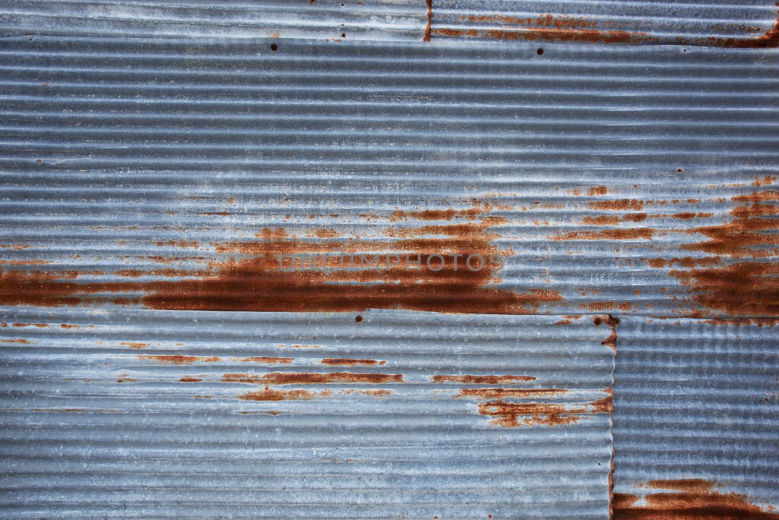 Old rusty zinc sheets for textured abstract background