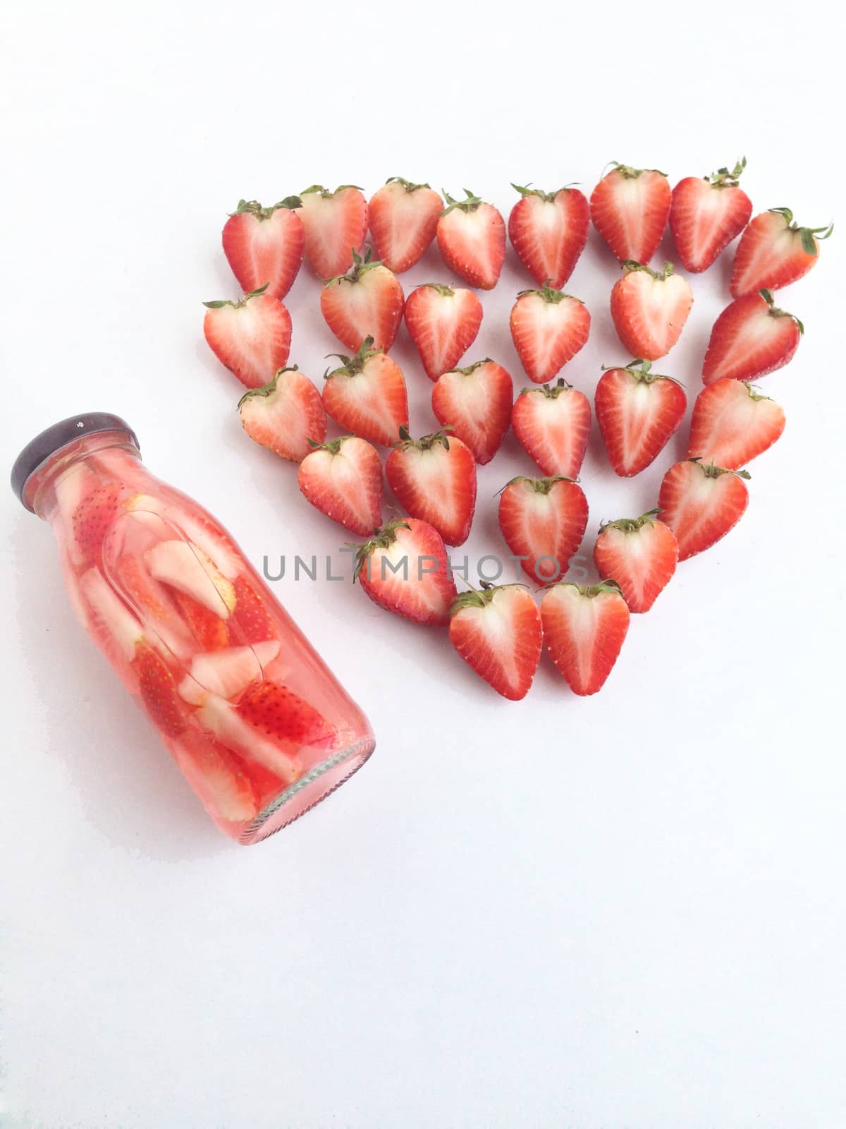 strawberry drinks and strawberry heart shaped by Bowonpat
