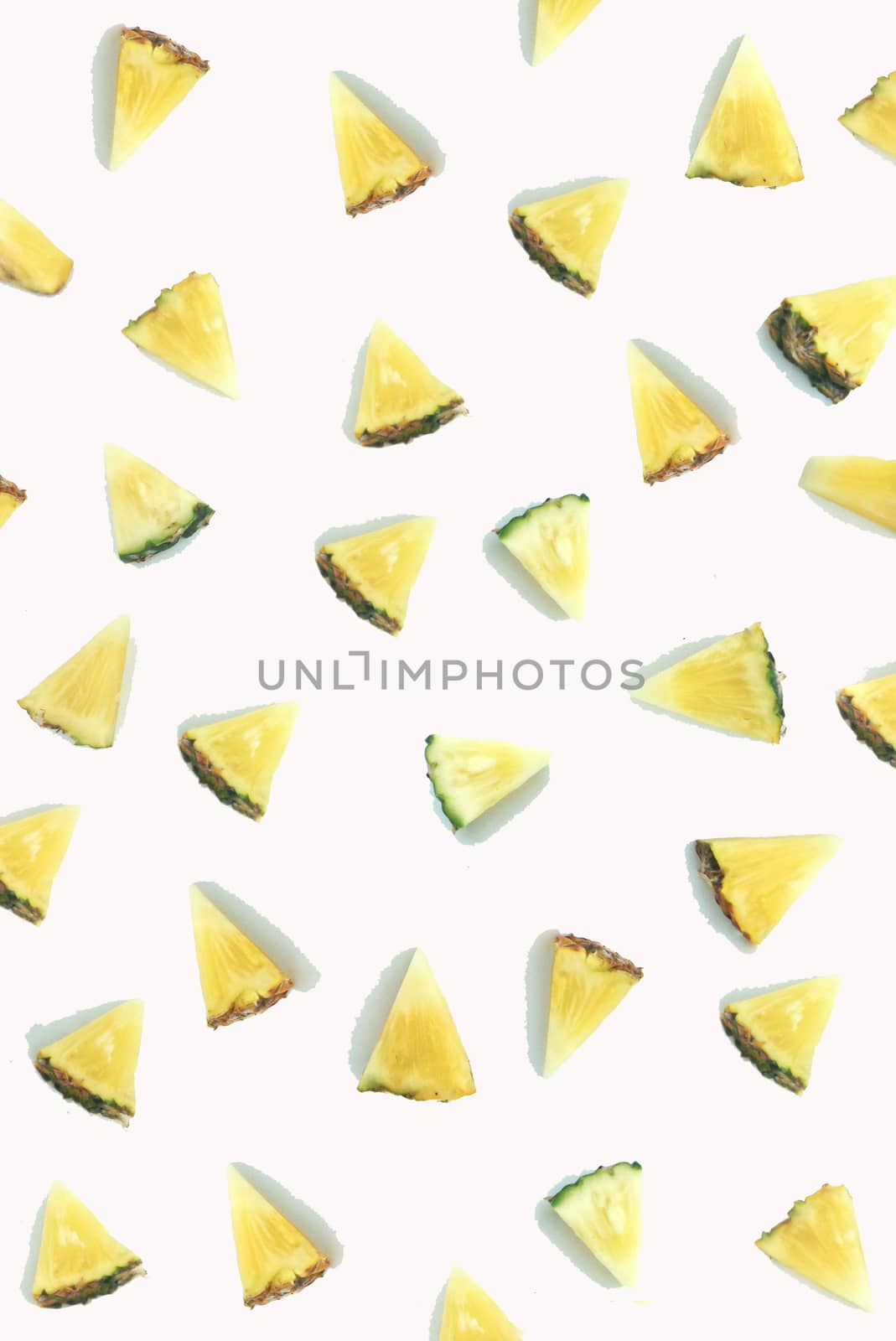 Fresh   triangular piece of pineapple by Bowonpat