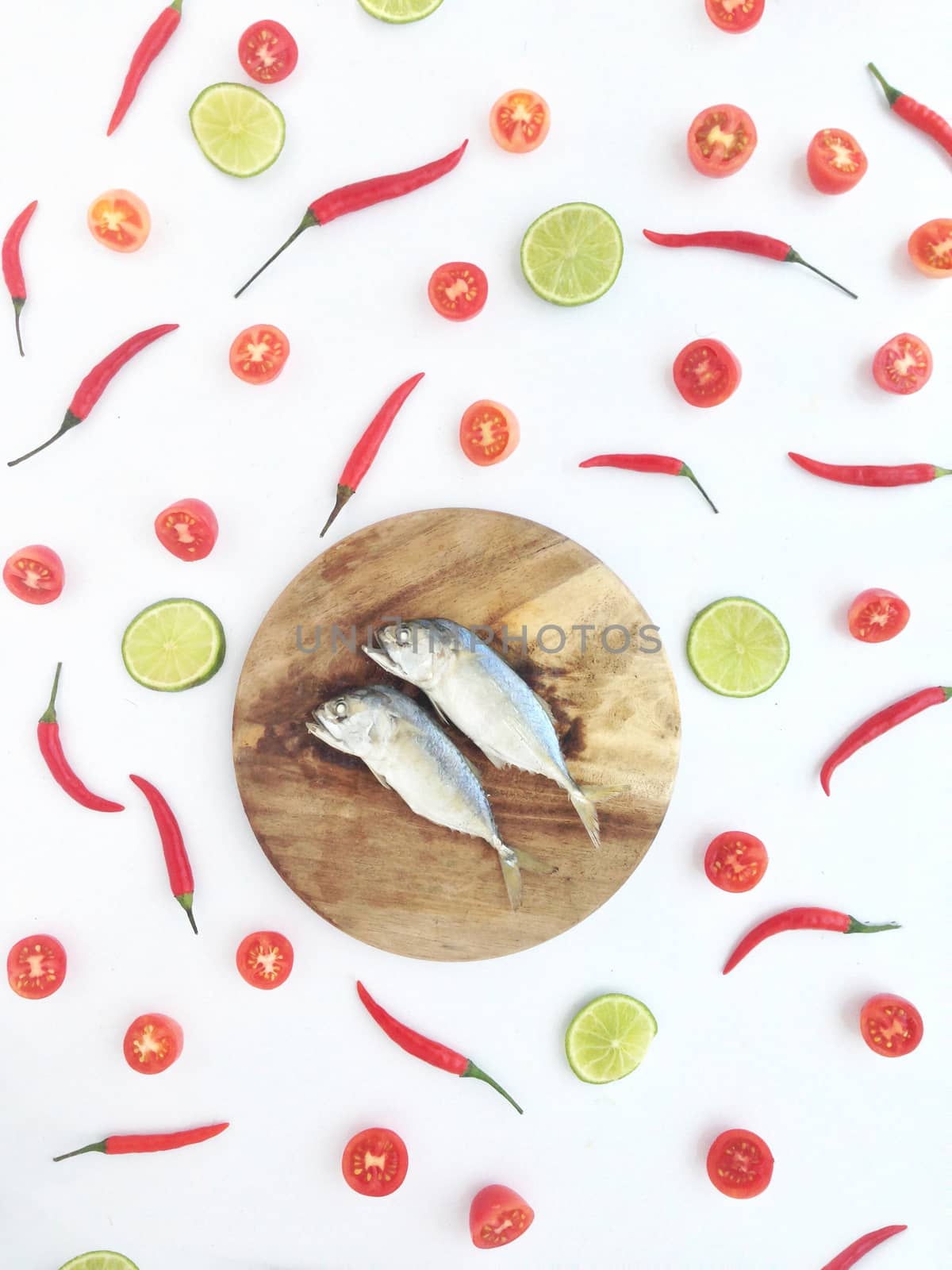 short mackerel among lime chili and tomato