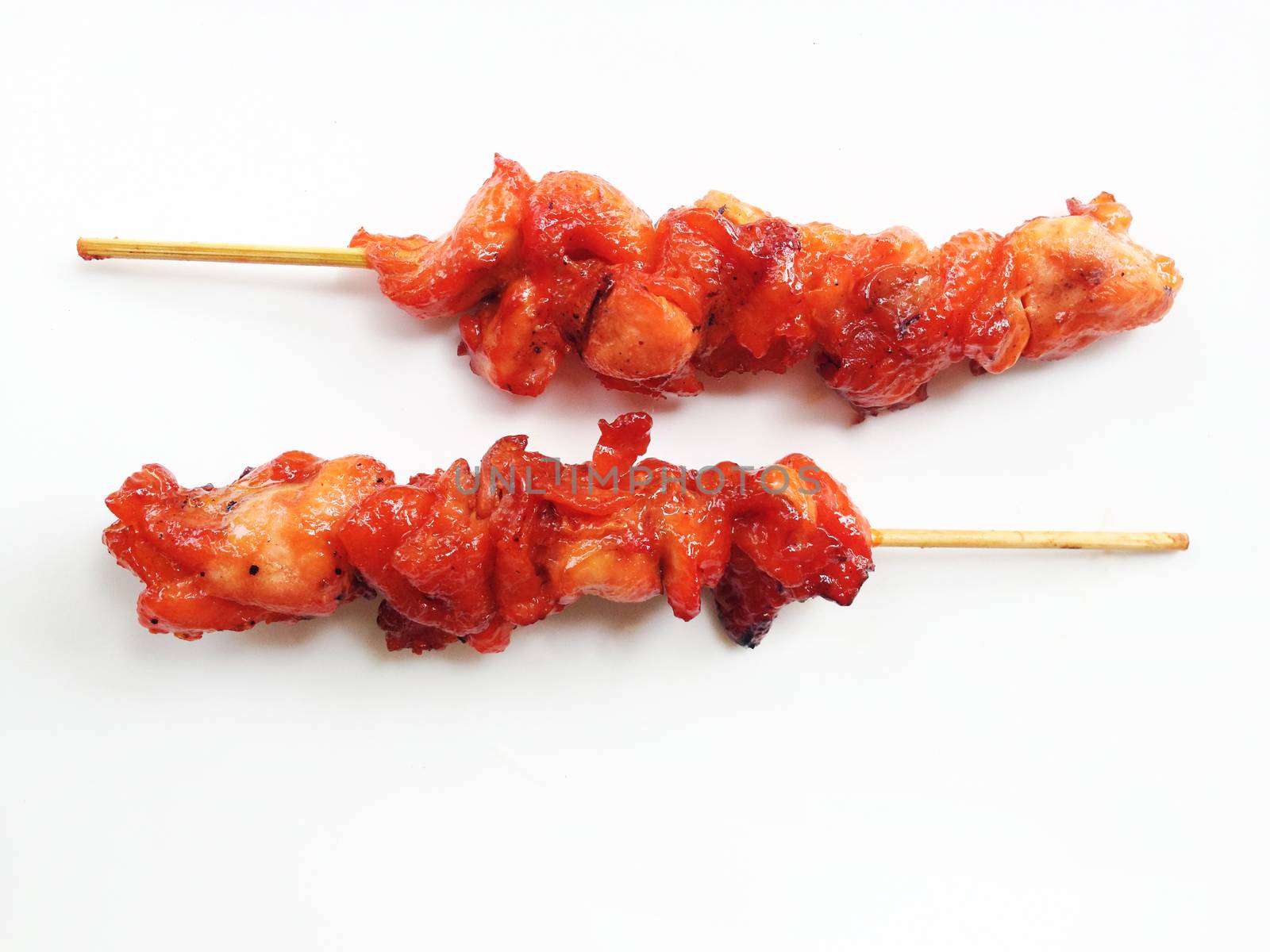 Grilled chicken on bamboo skewers  by Bowonpat
