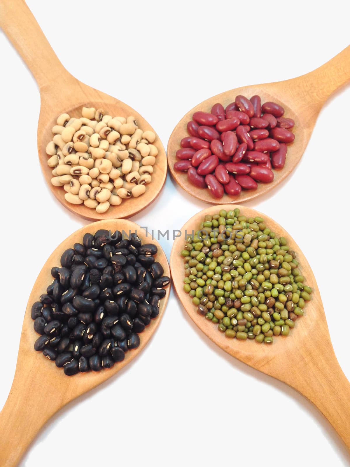 Varieties of beans, peas on white background