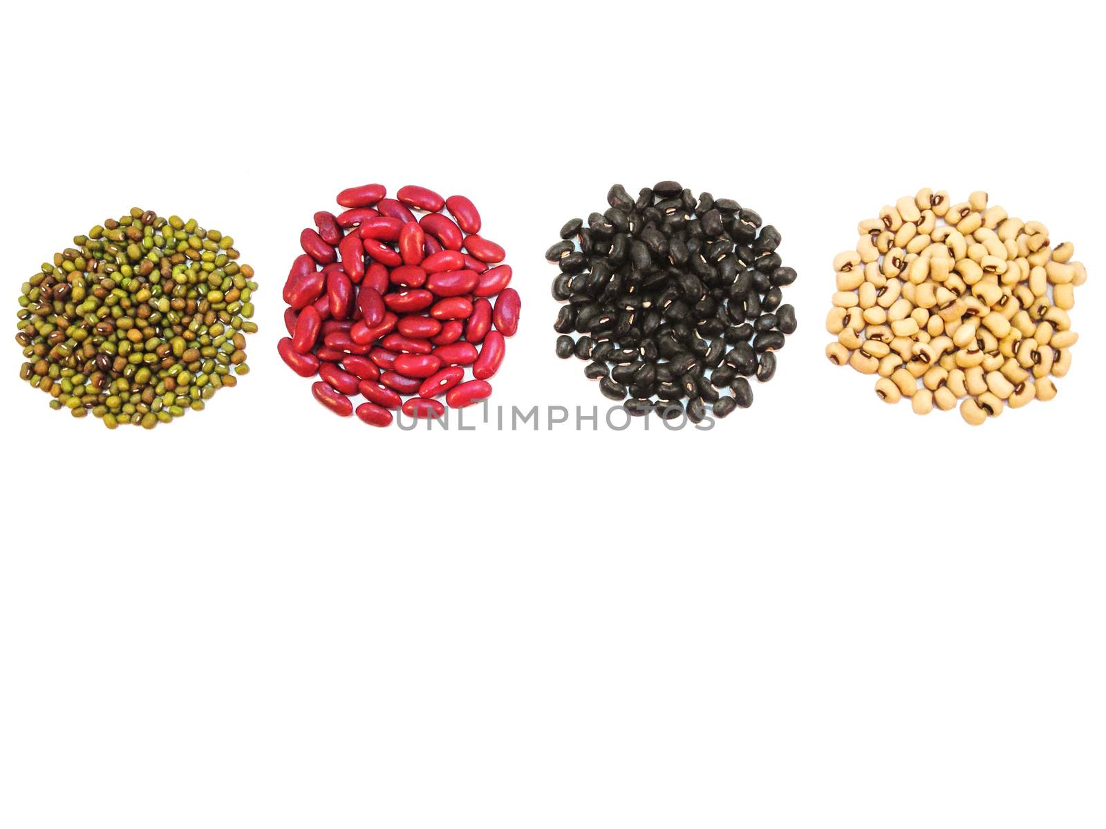 Black eye peas, mung beans, black beans and red kidney beans on white background