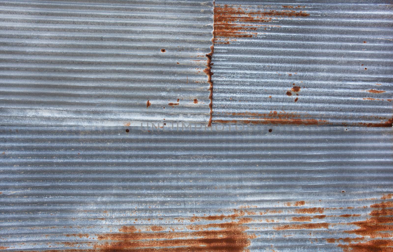 Old rusty zinc sheets for textured abstract background