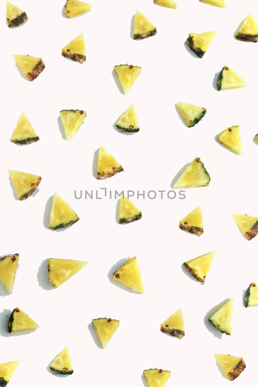 Fresh   triangular piece of pineapple by Bowonpat
