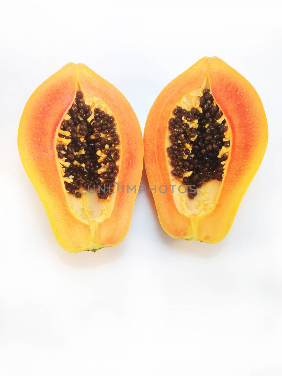 slices of sweet papaya on white background by Bowonpat