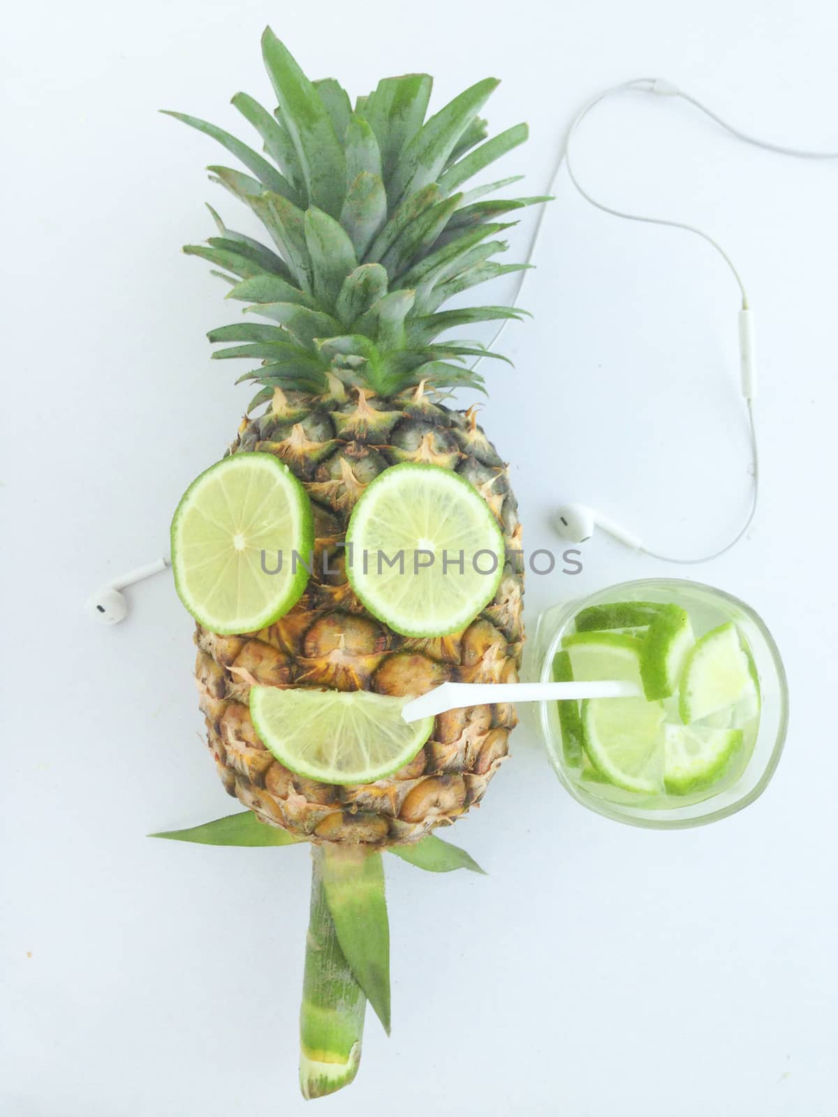 pineapple with mouth and eye made from lime