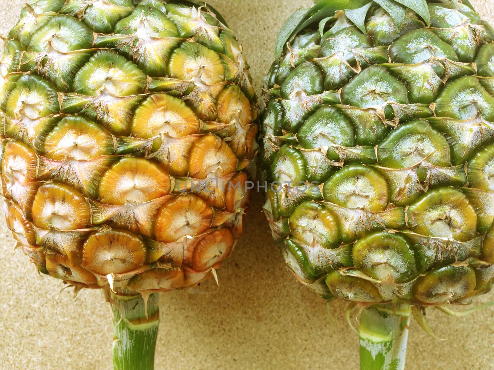 pineapple isolated on plywood background