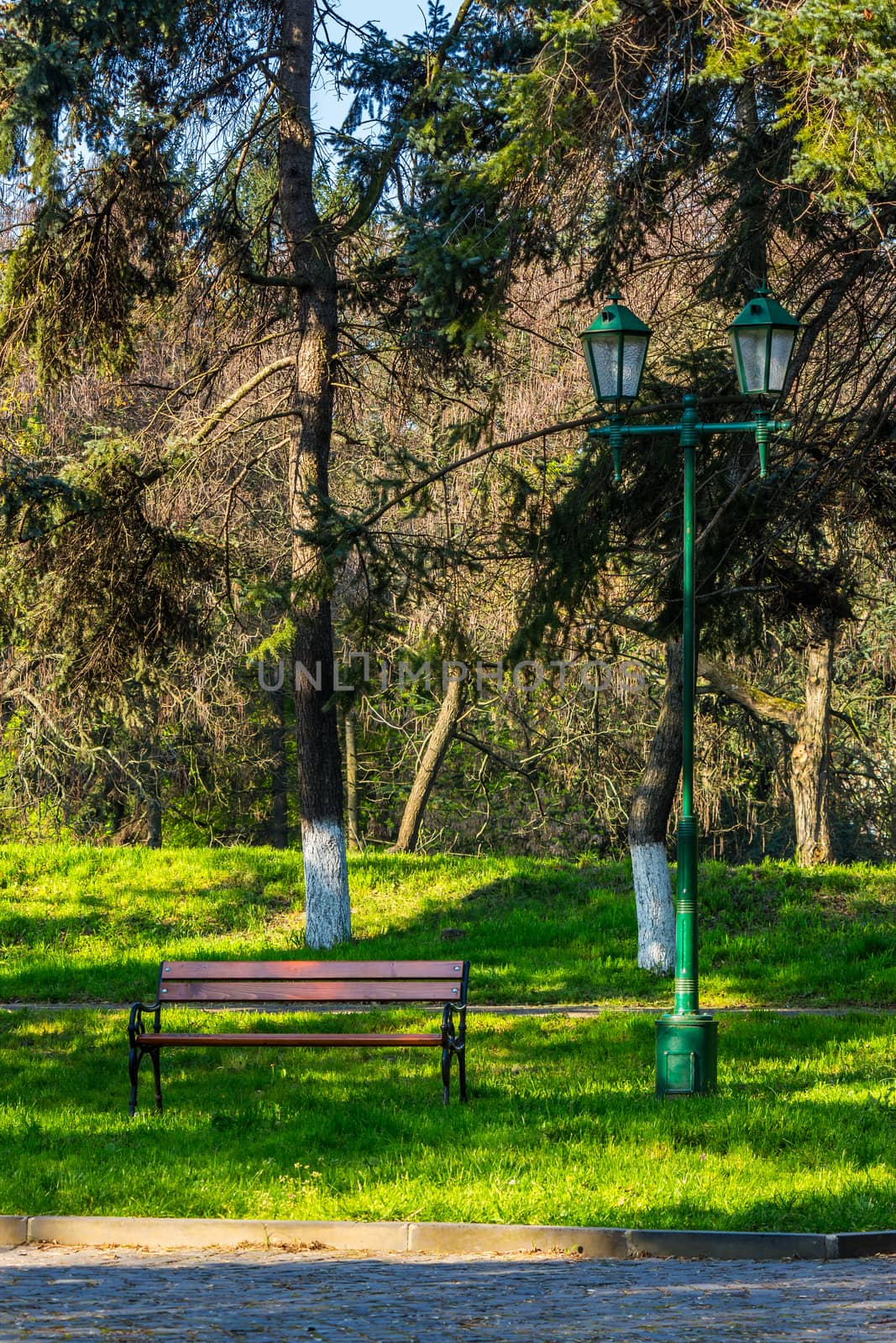 old city park with bench and lantern by Pellinni