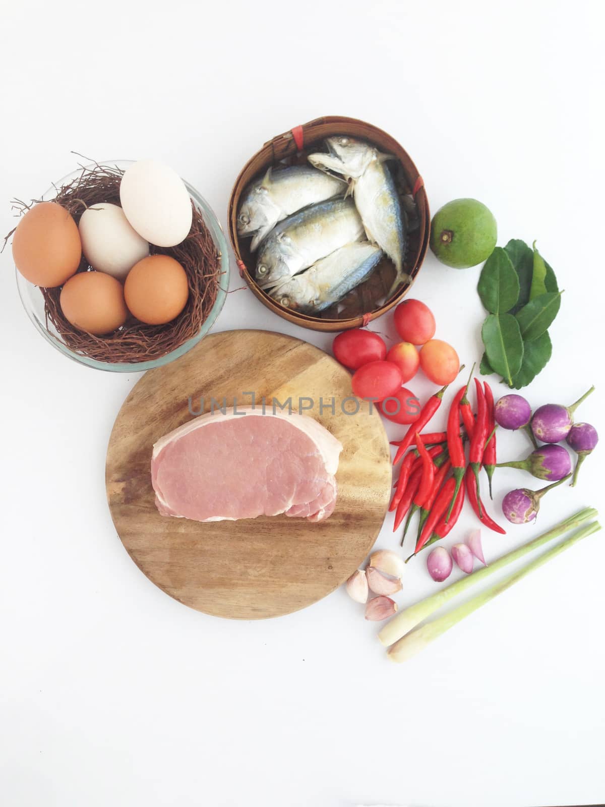 pork on cutting board egg and short mackerel among Vegetable by Bowonpat