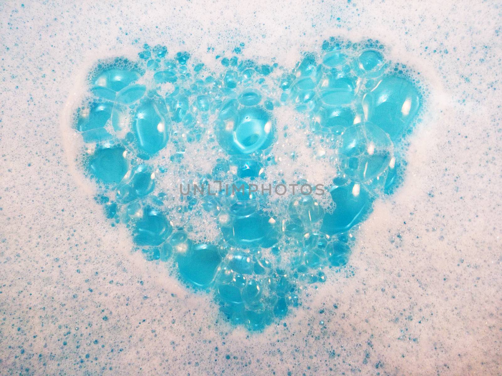 Heart shape of soapsuds and air bubble by Bowonpat