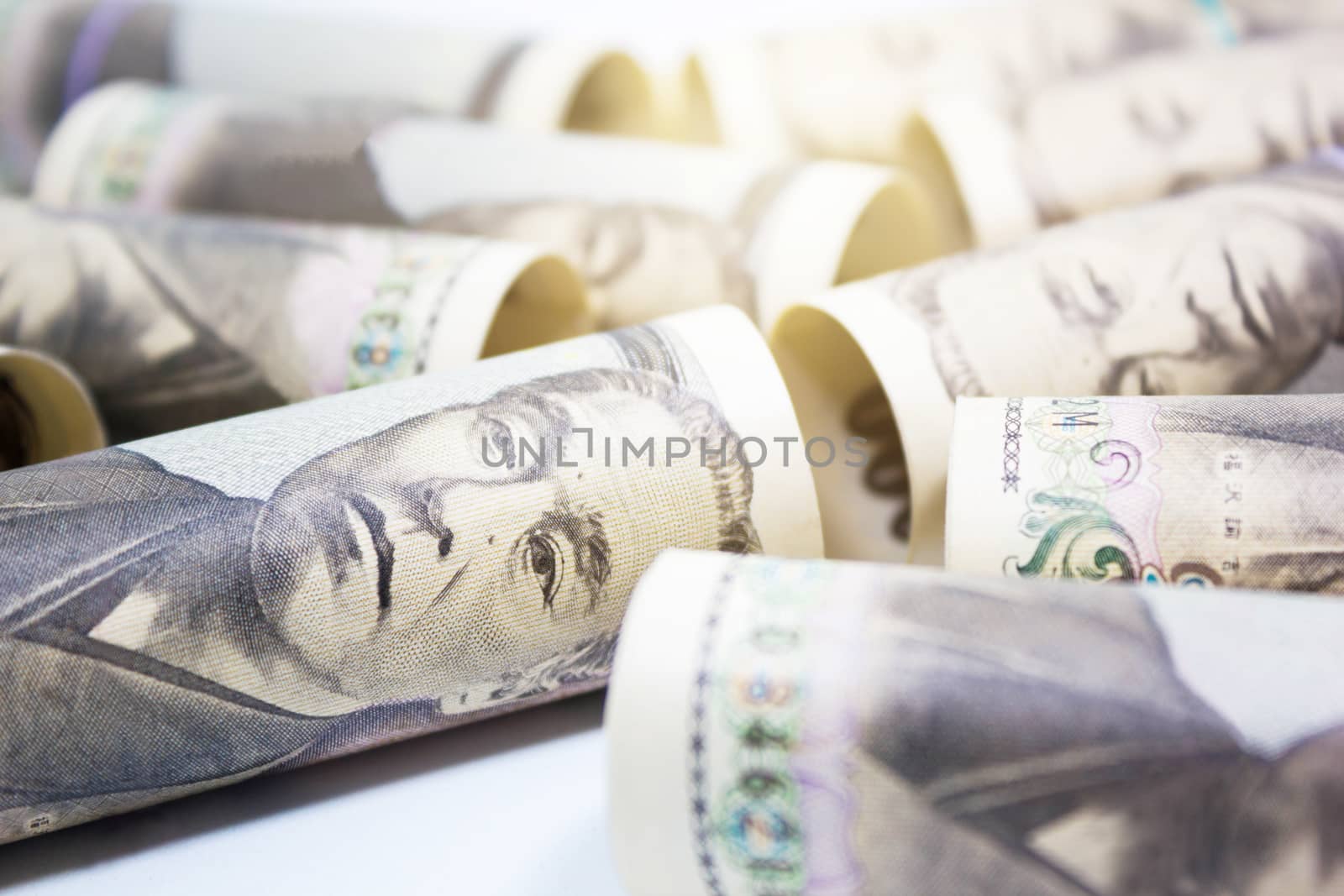 Roll Up Of Money Yen Banknote On Vintage Wooden Background, Busi by rakoptonLPN
