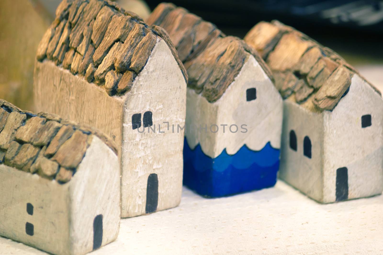 Miniature House On Top Table, Building Blocks Arranged In Row. by rakoptonLPN