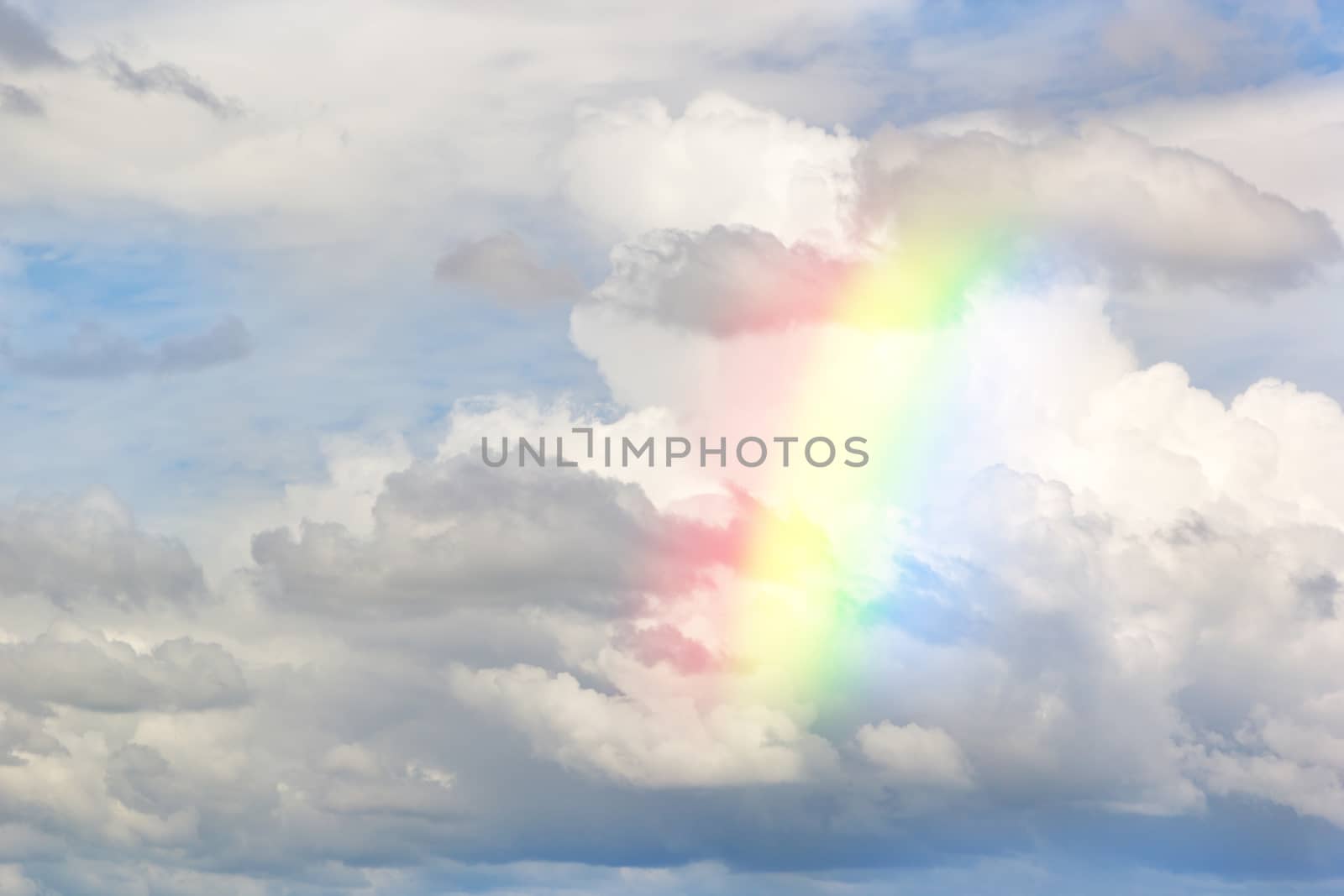 Beautiful Classic Rainbow Across In The Blue Sky After The Rain, Rainbow Is A Natural Phenomenon That Occurs After Rain, Rainbow Consists Of Purple, Indigo Blue, Blue, Green, Yellow, Orange And Red.
