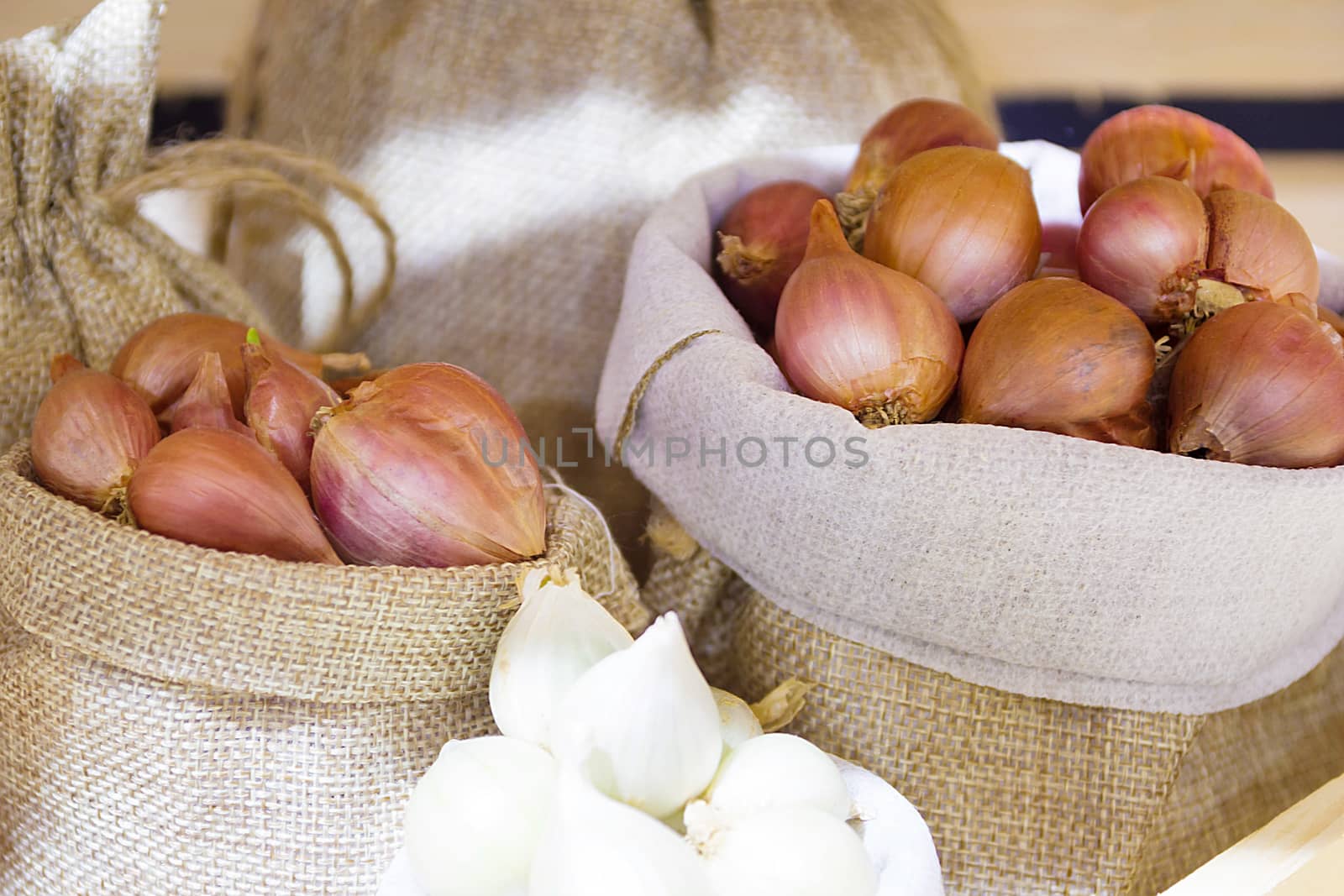 Red Onion In Fabric Bag, Bulb Onion Is Good For Health. by rakoptonLPN