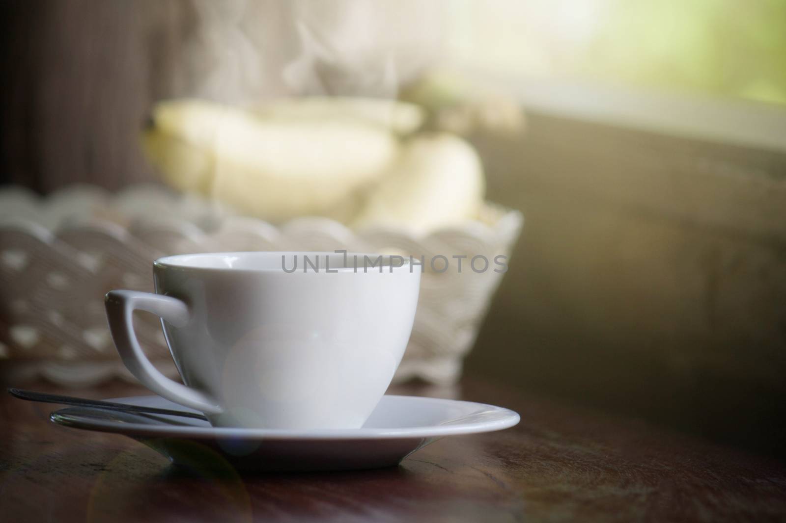 White Coffee Cup With Smoke On Soft Light In Morning For Backgro by rakoptonLPN