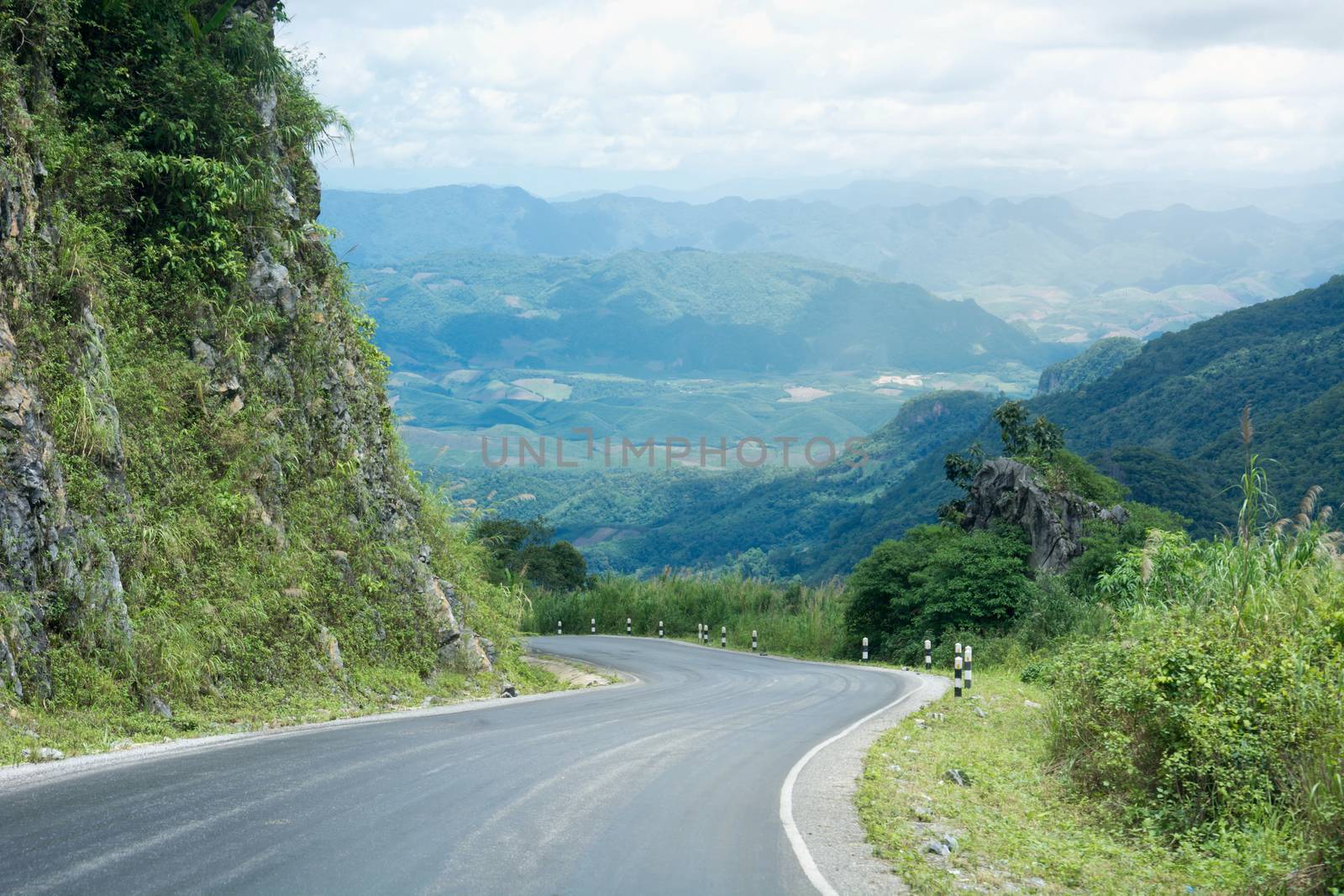 Long And Winding Rural Roads Leading Through Green Hills In Laos by rakoptonLPN