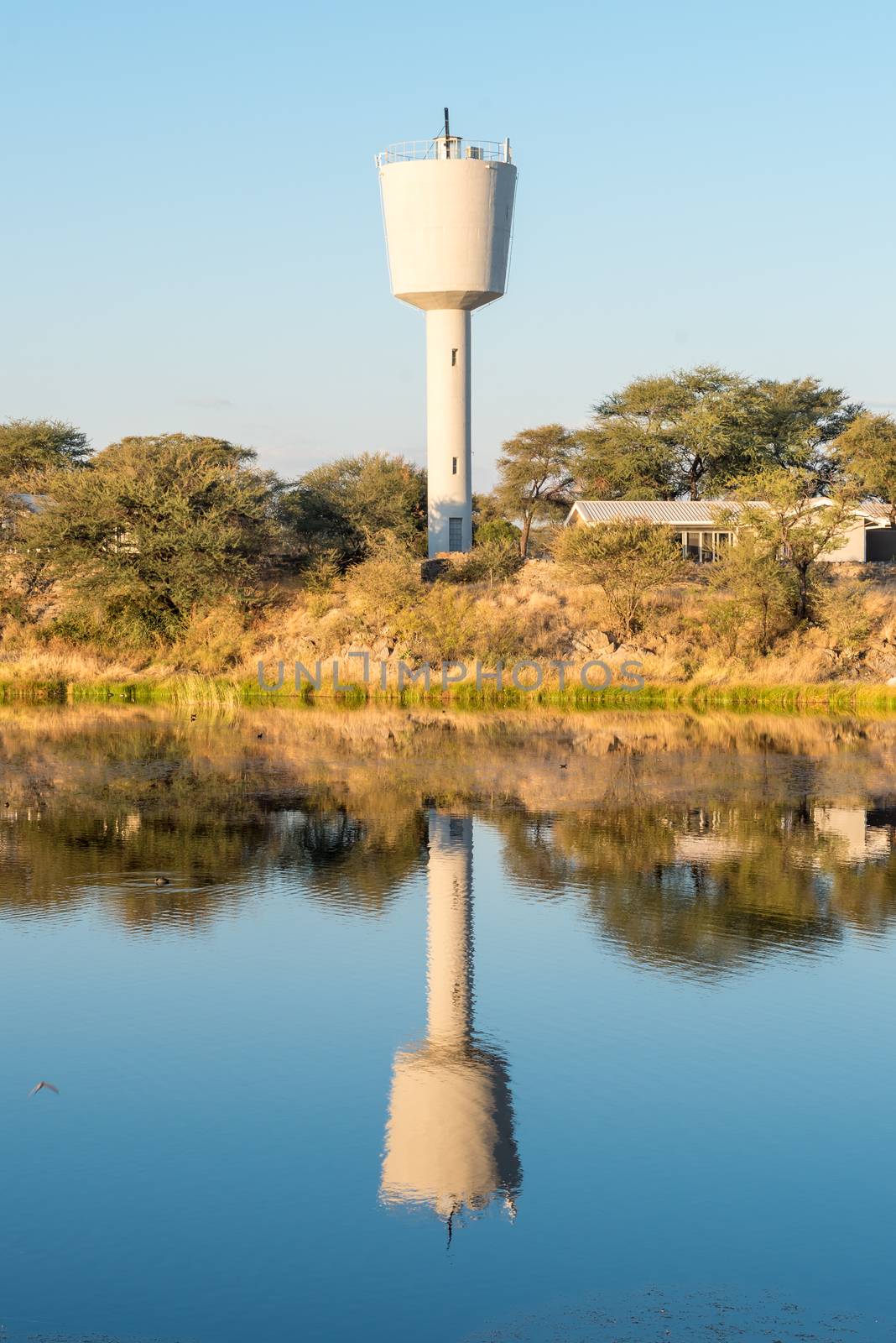 Sunset view with reflection of the reservoir at Gross Barmen, near Okahandja in the Otjozondjupa Region of Namibia
