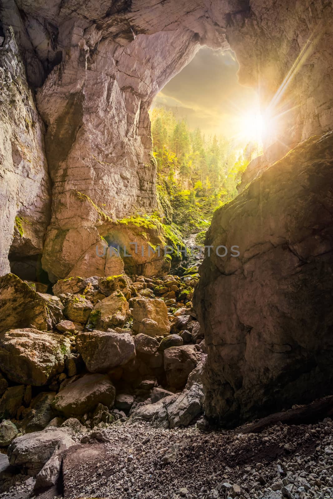 Cetatile cave in romania. Natural citadel sculpted by river in romanian mountains in evening light
