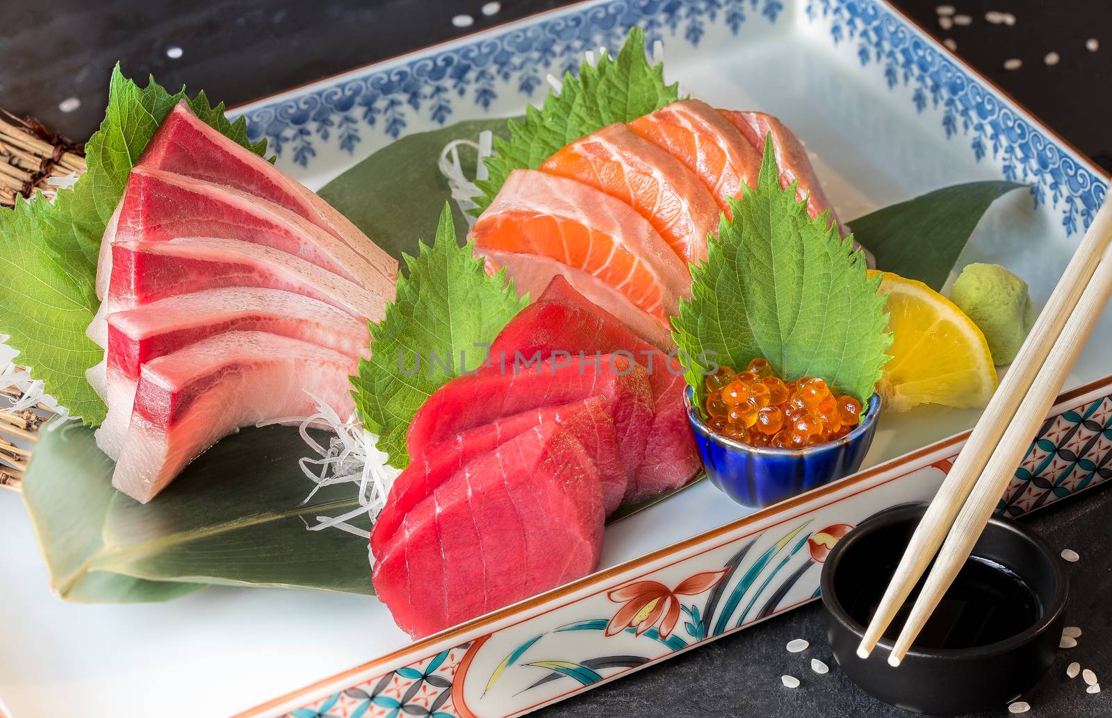 sashimi set of tuna, hamachi, salmon and salmon eggs by Obmeetsworld