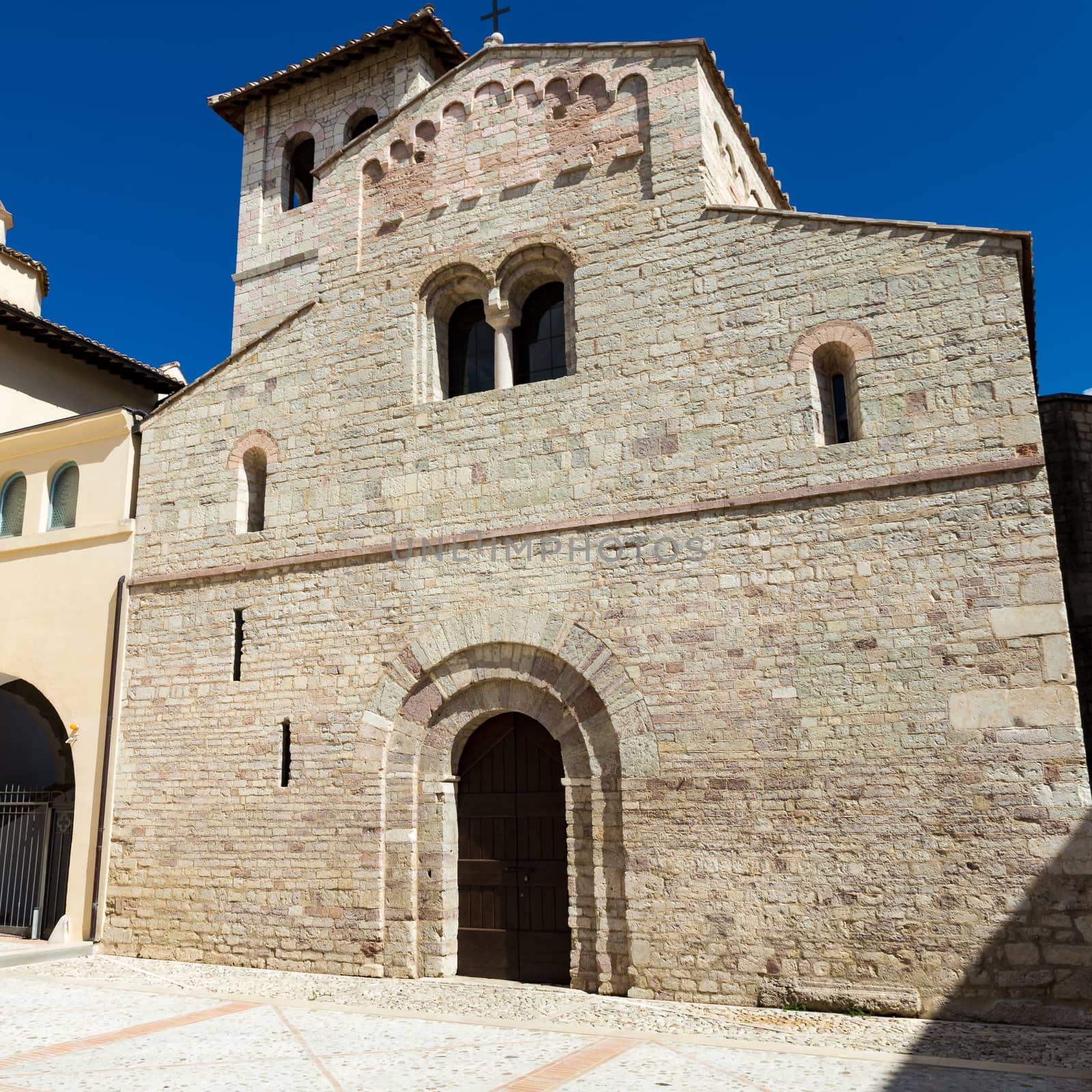 view of the splendid medieval façade of the Basilica of Sant'Eufemia in Spoleto - (Italy)