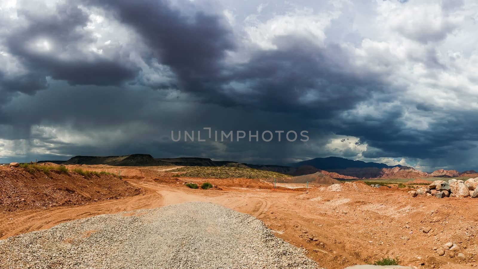 Ominous Stormy Sky and Cumulus Clouds with Rain in the Desert.