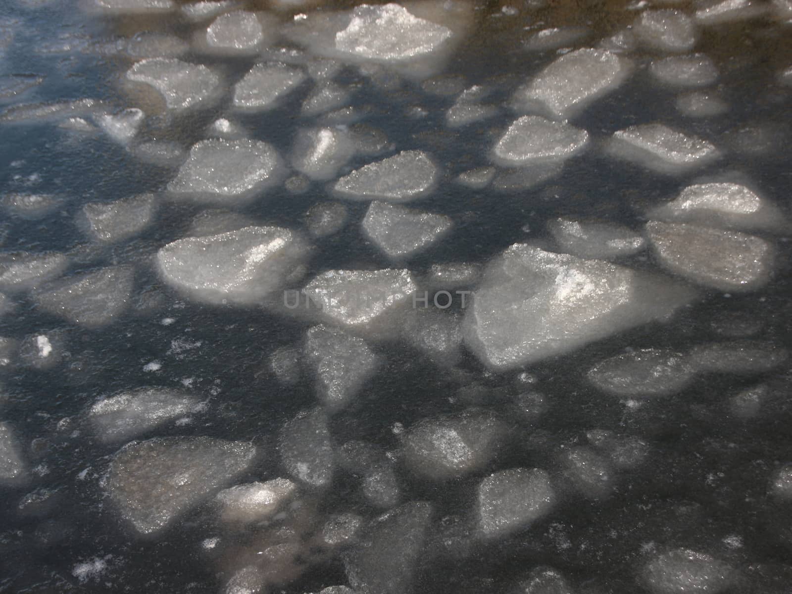 Background of Cold Winter Water with Large Ice Floes Apart