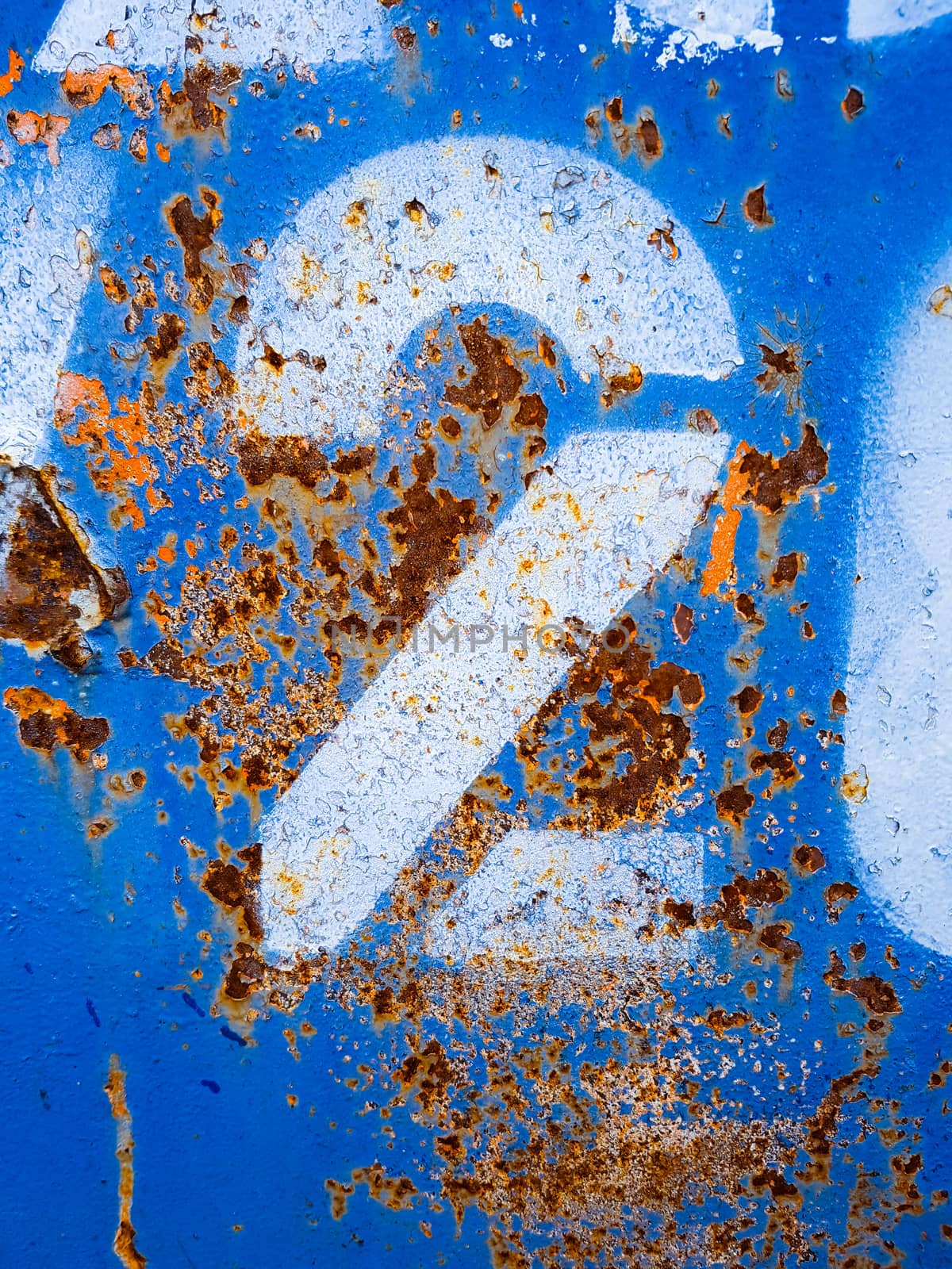 Number two 2 on Blue Rust Metal Background