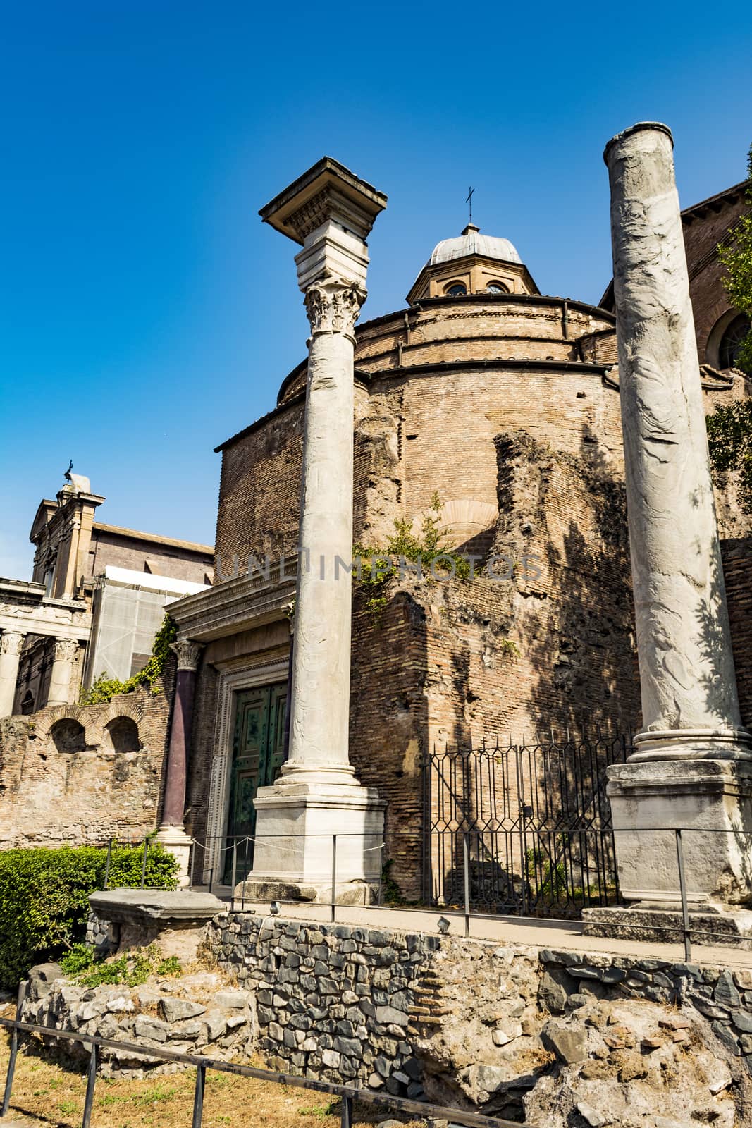 Temple of Romulus in the Roman Forum, Rome, Italy. It's intact because it was turned into the entrance to the Church of Saints Cosma and Damiano.