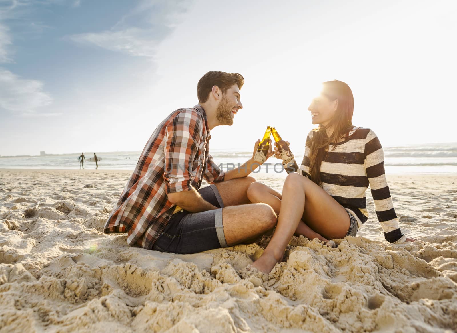 Couple on the beach by Iko