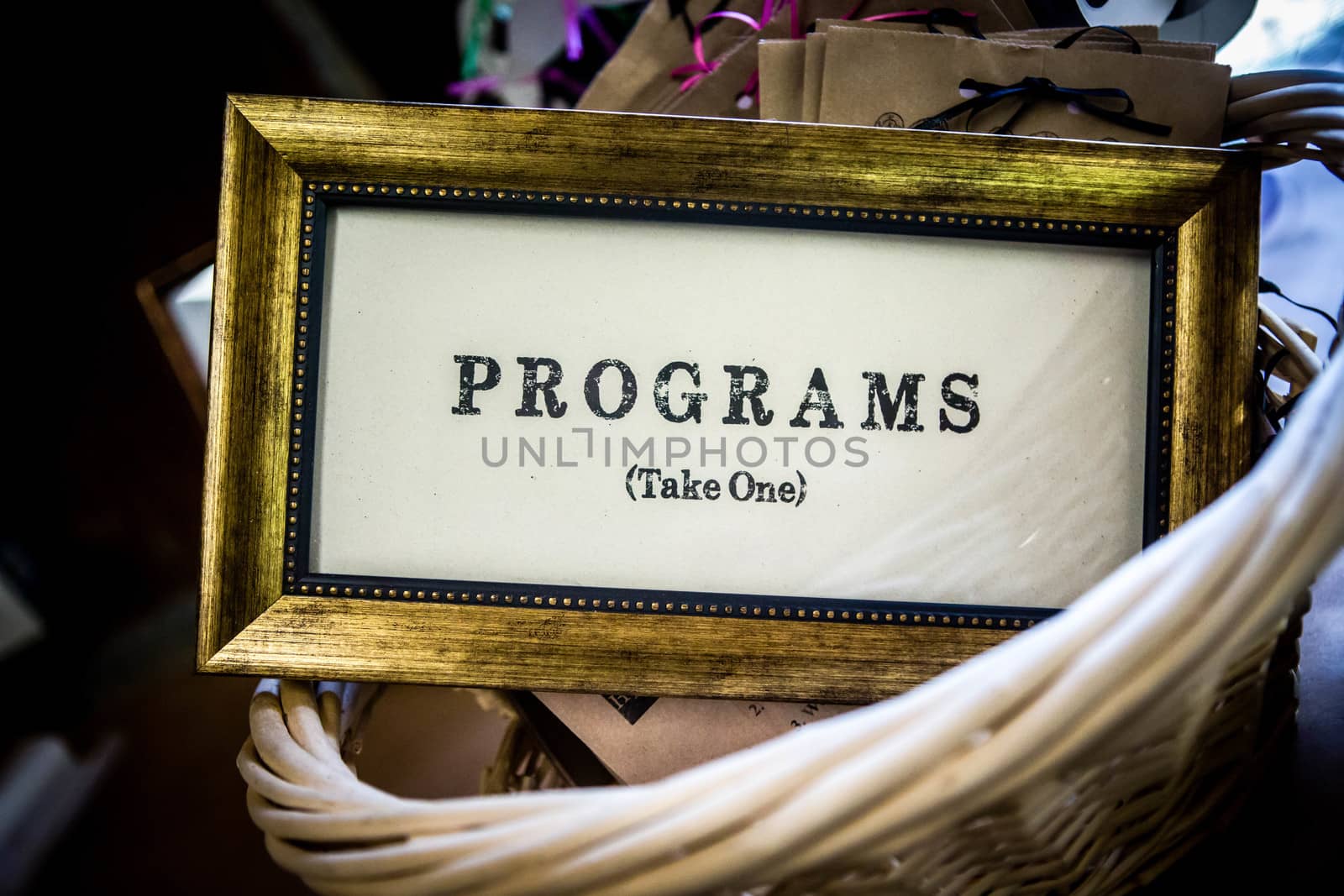 Rustic, retro, chic, or old sign used at a wedding or theater performance to hand out programs.