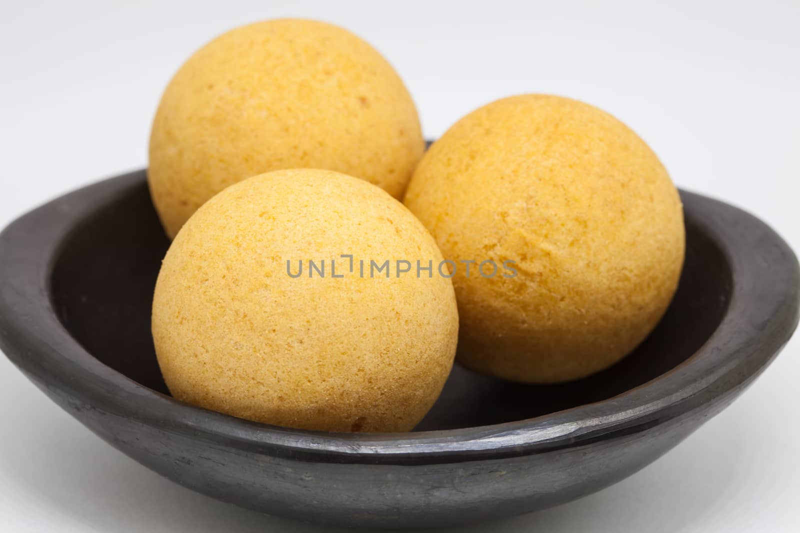 Traditional Colombian buñuelos (Deep Fried Cheese Bread) isolated on white background