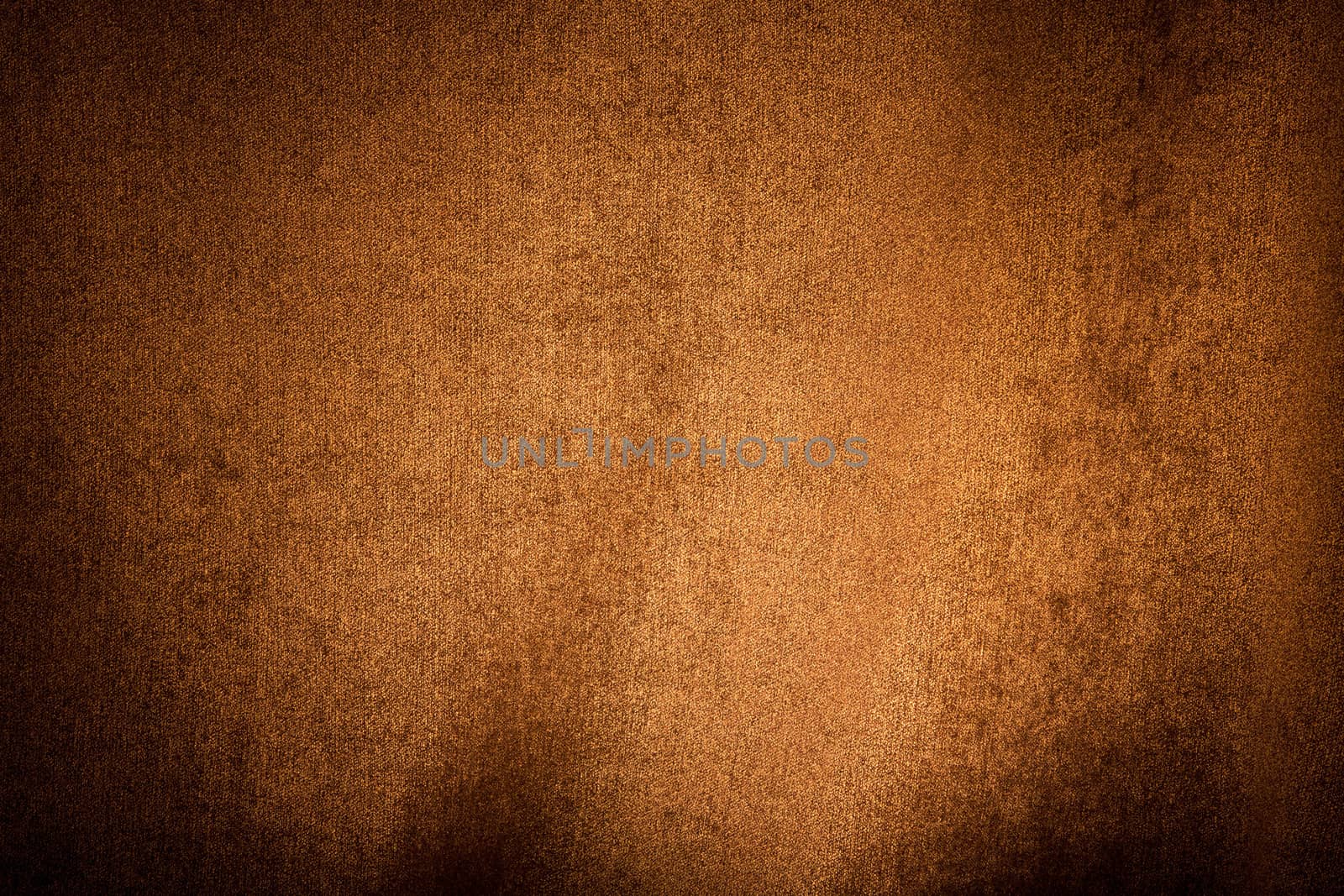An orange and brown textured background with variations in light.