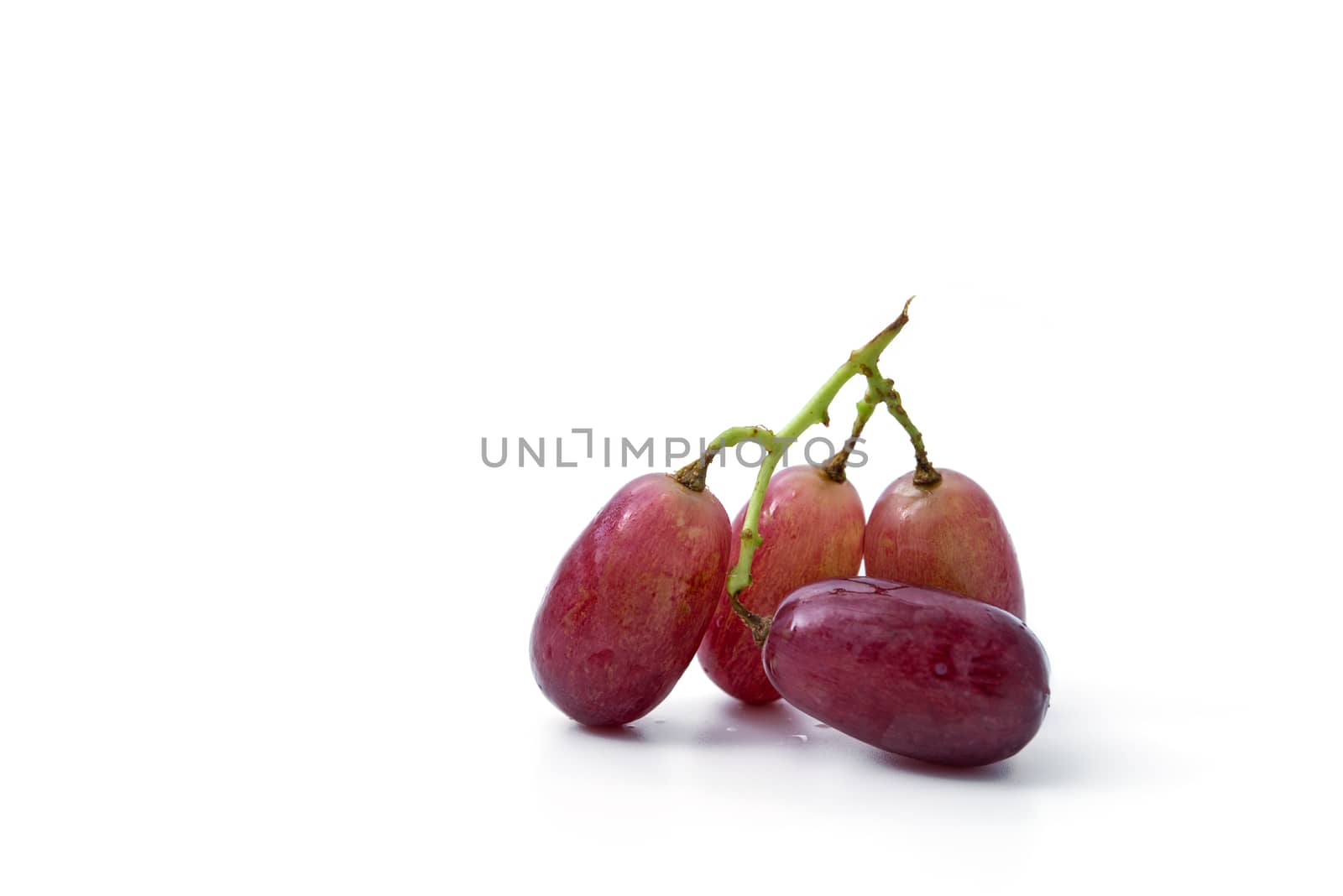 bunch of grapes isolated on white by antpkr