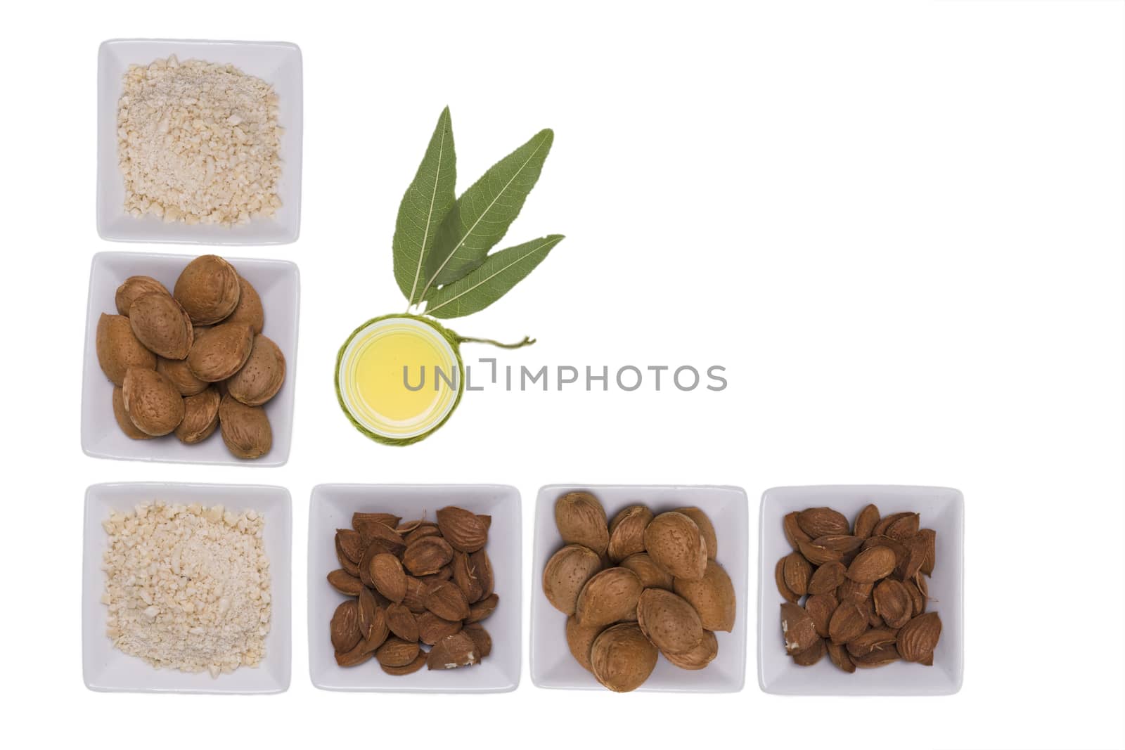 Almonds over white background. by osmar01