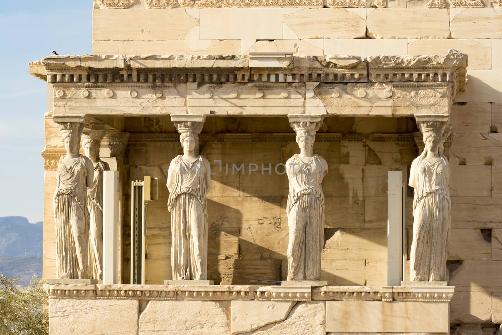 karyatides statues inside acropolis