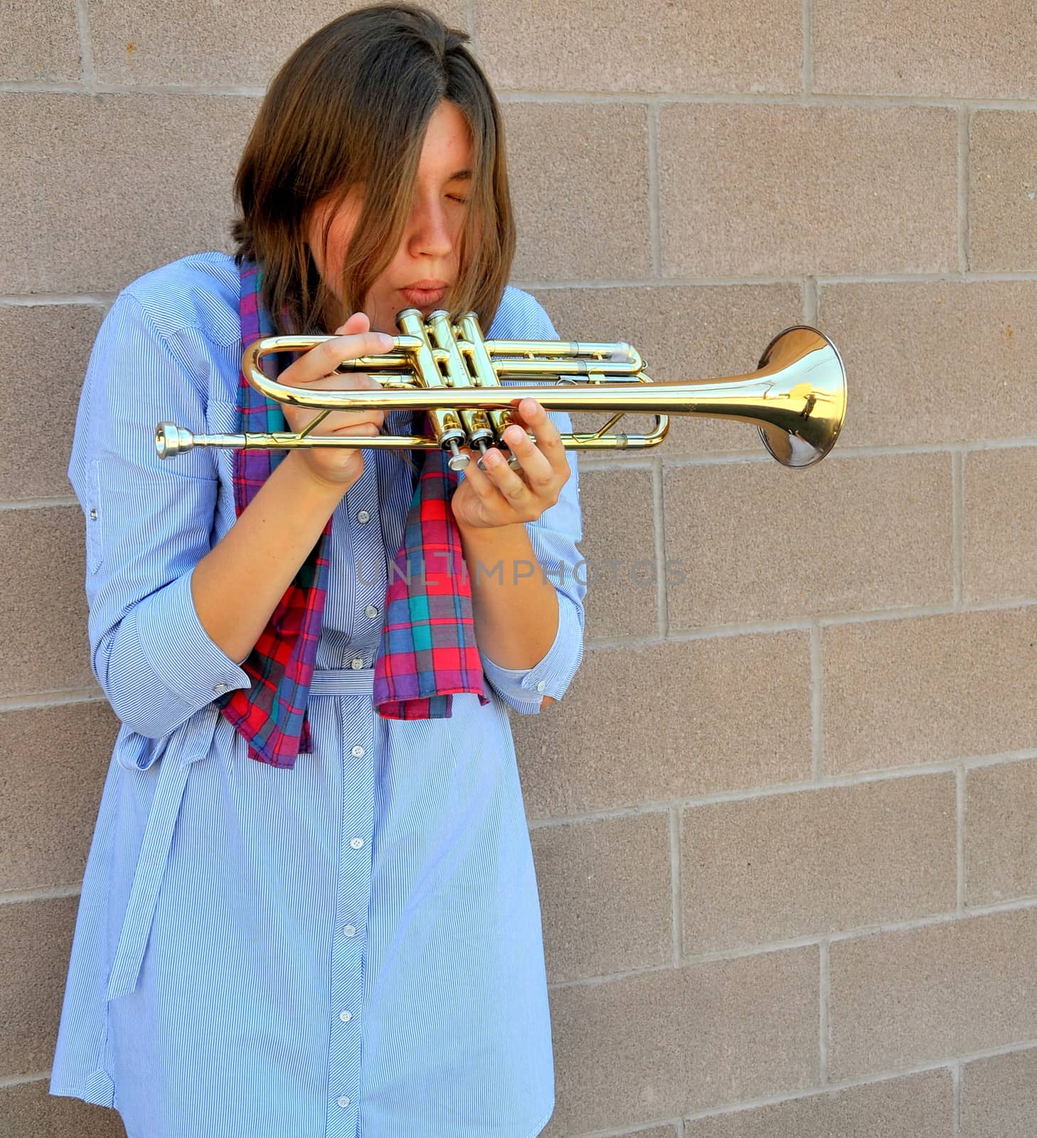 Female jazz trumpet player. by oscarcwilliams
