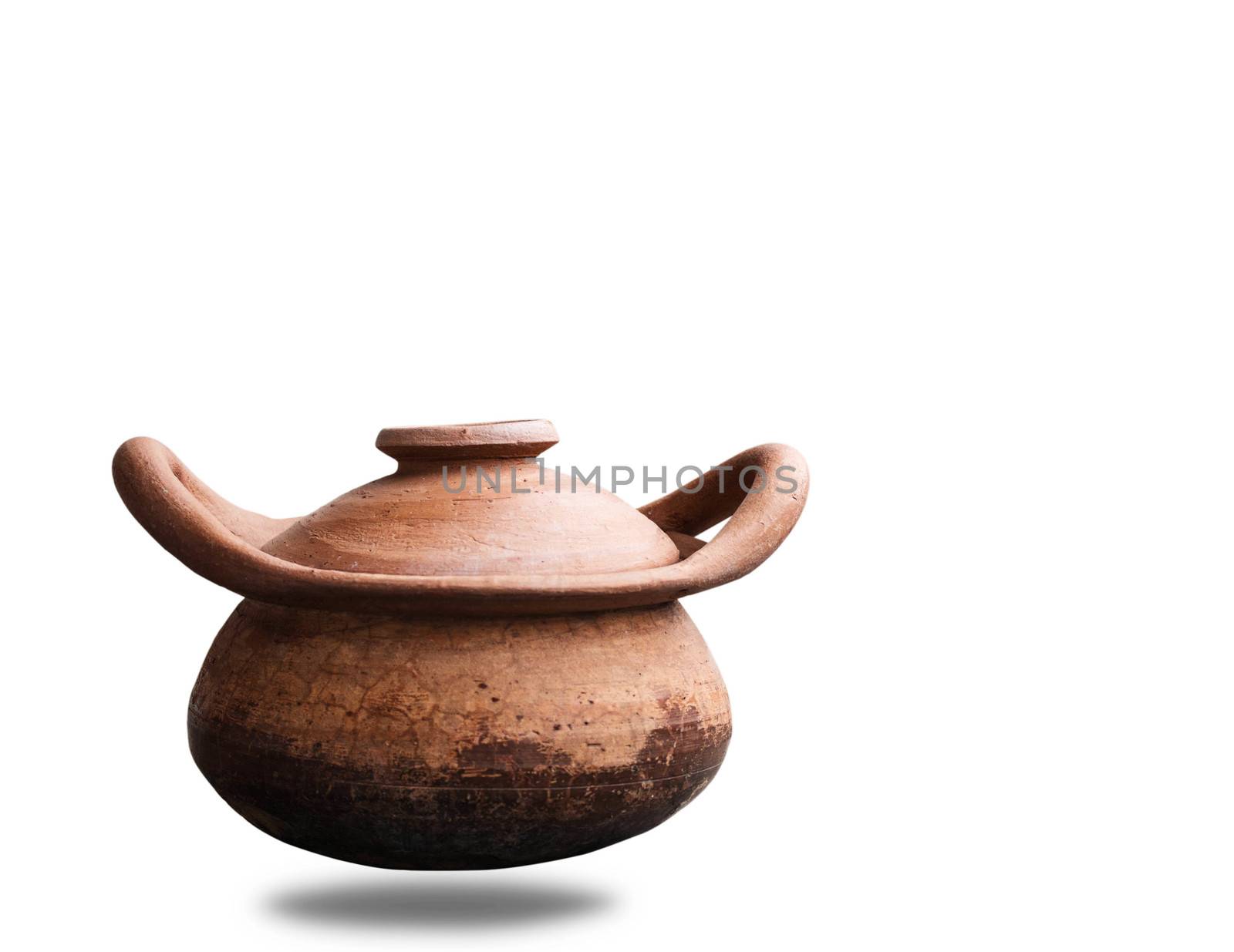 Old clay pot on a white background.