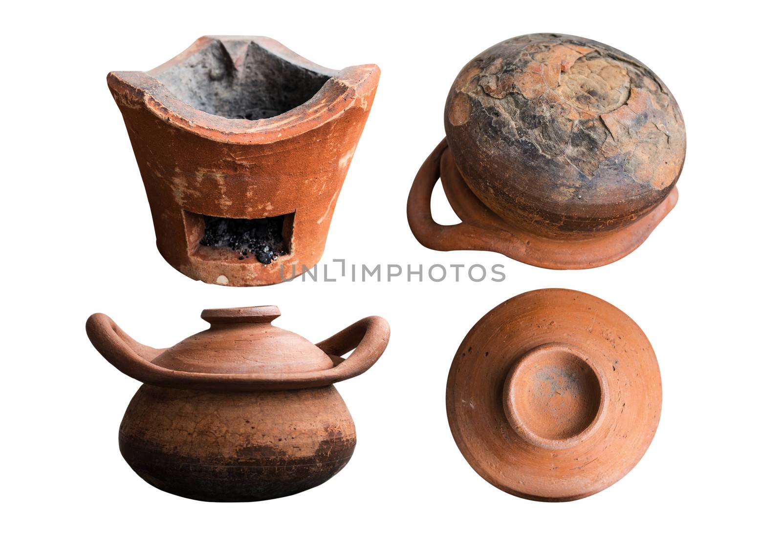 Old clay pot and stove of cracks on white background.